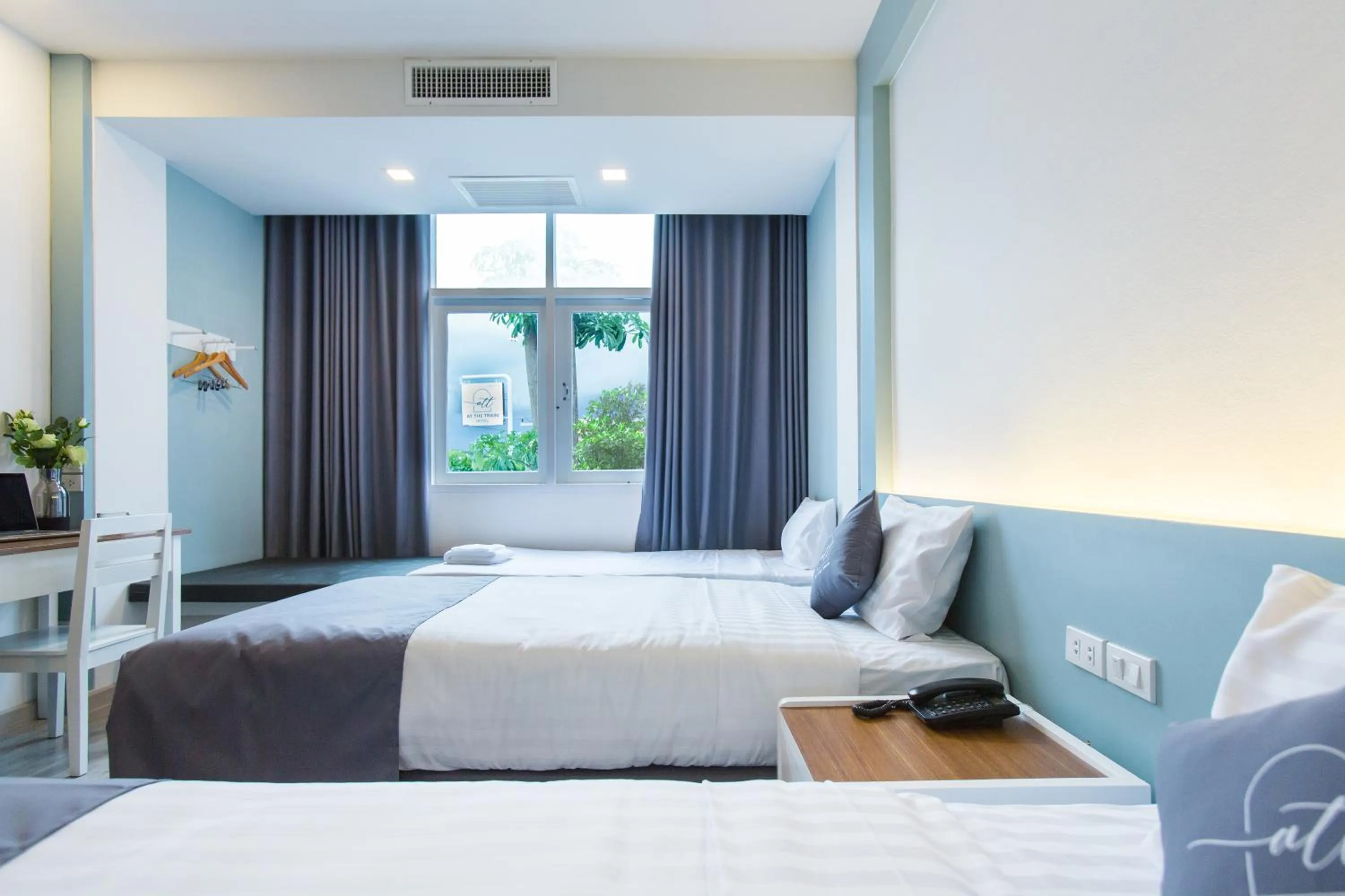 Bed in At the Train Chiang Mai Hotel