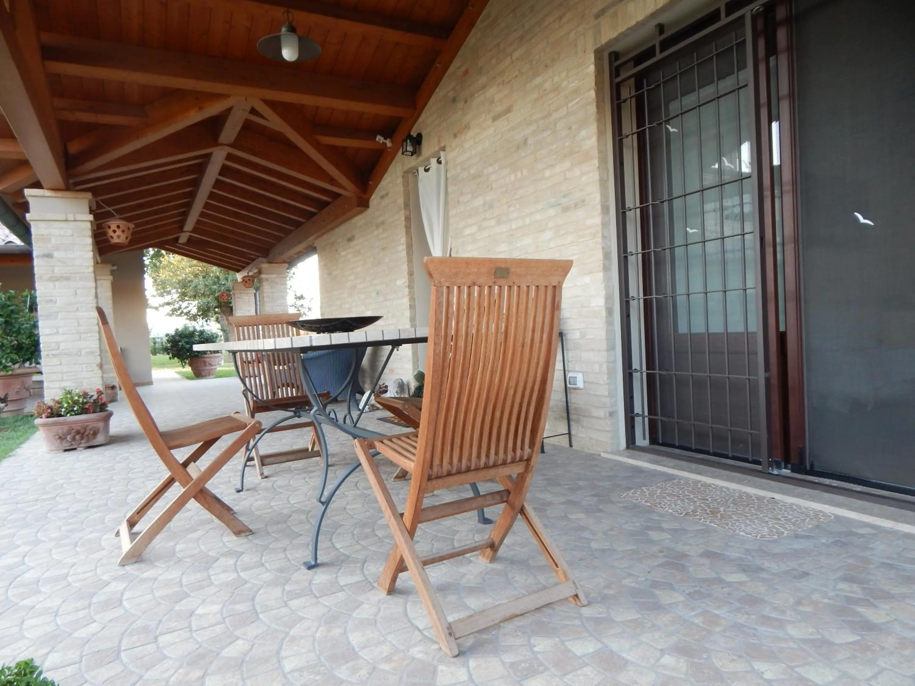 Patio in B & B LE TRE B