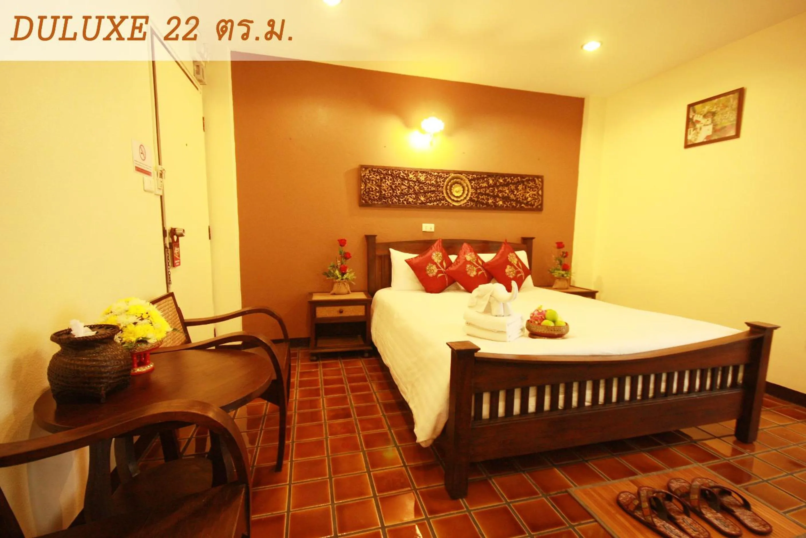 Bed in CM Night Bazaar Boutique Hotel - โรงแรม ซี เอ็ม ไนท์บาซาร์ บูทีค