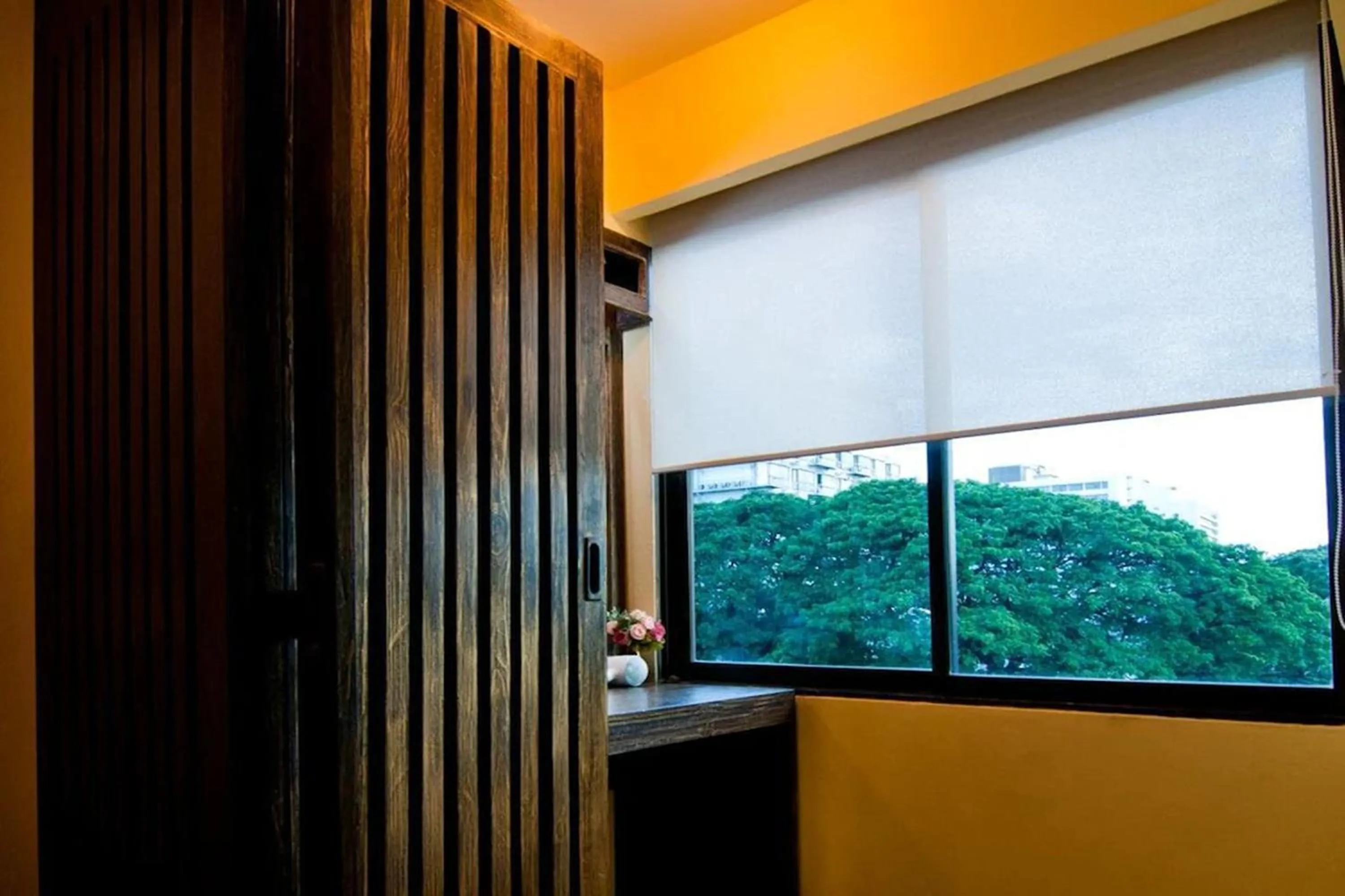 Bedroom in CM Night Bazaar Boutique Hotel - โรงแรม ซี เอ็ม ไนท์บาซาร์ บูทีค