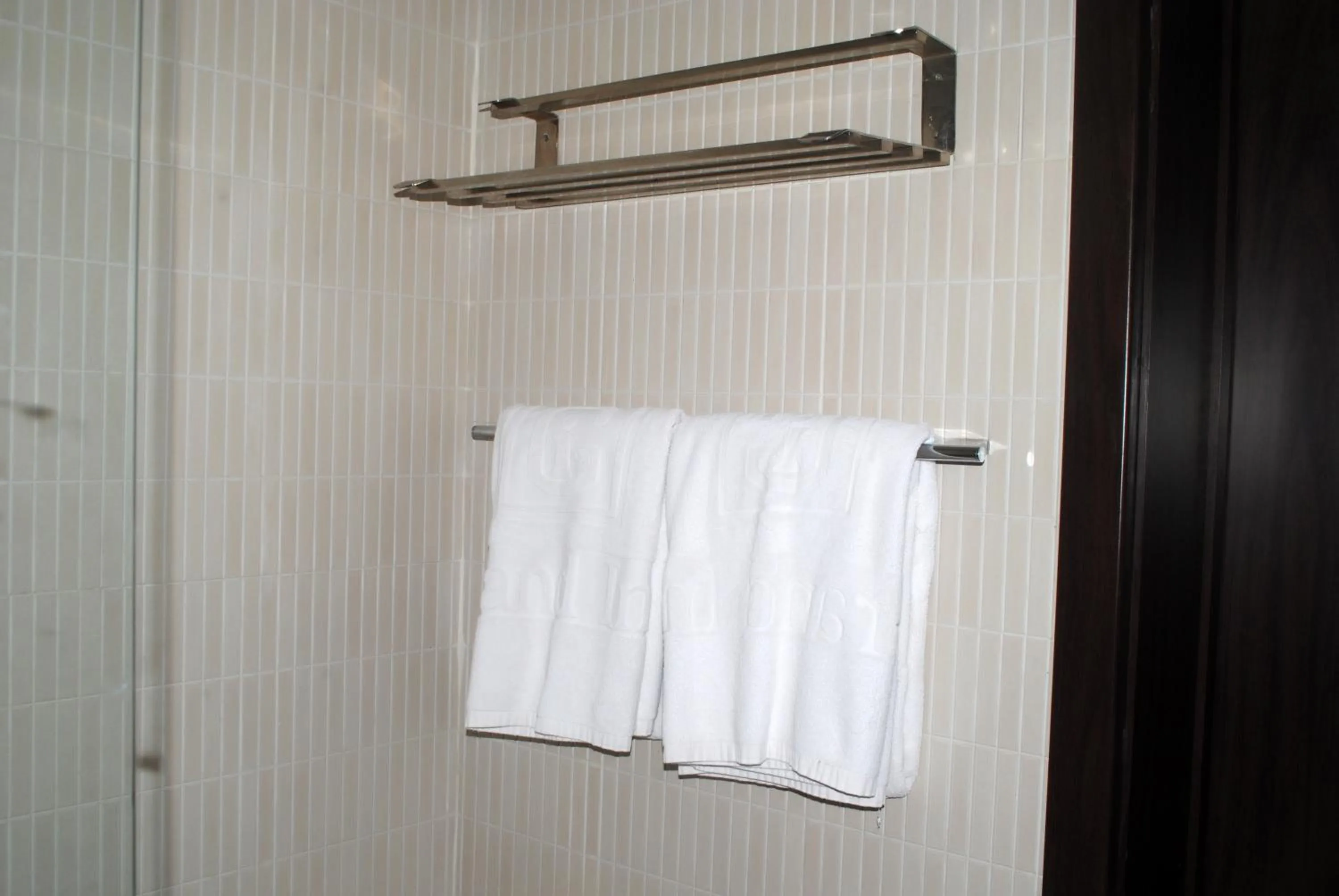 Bathroom in Grand Inn & Suites