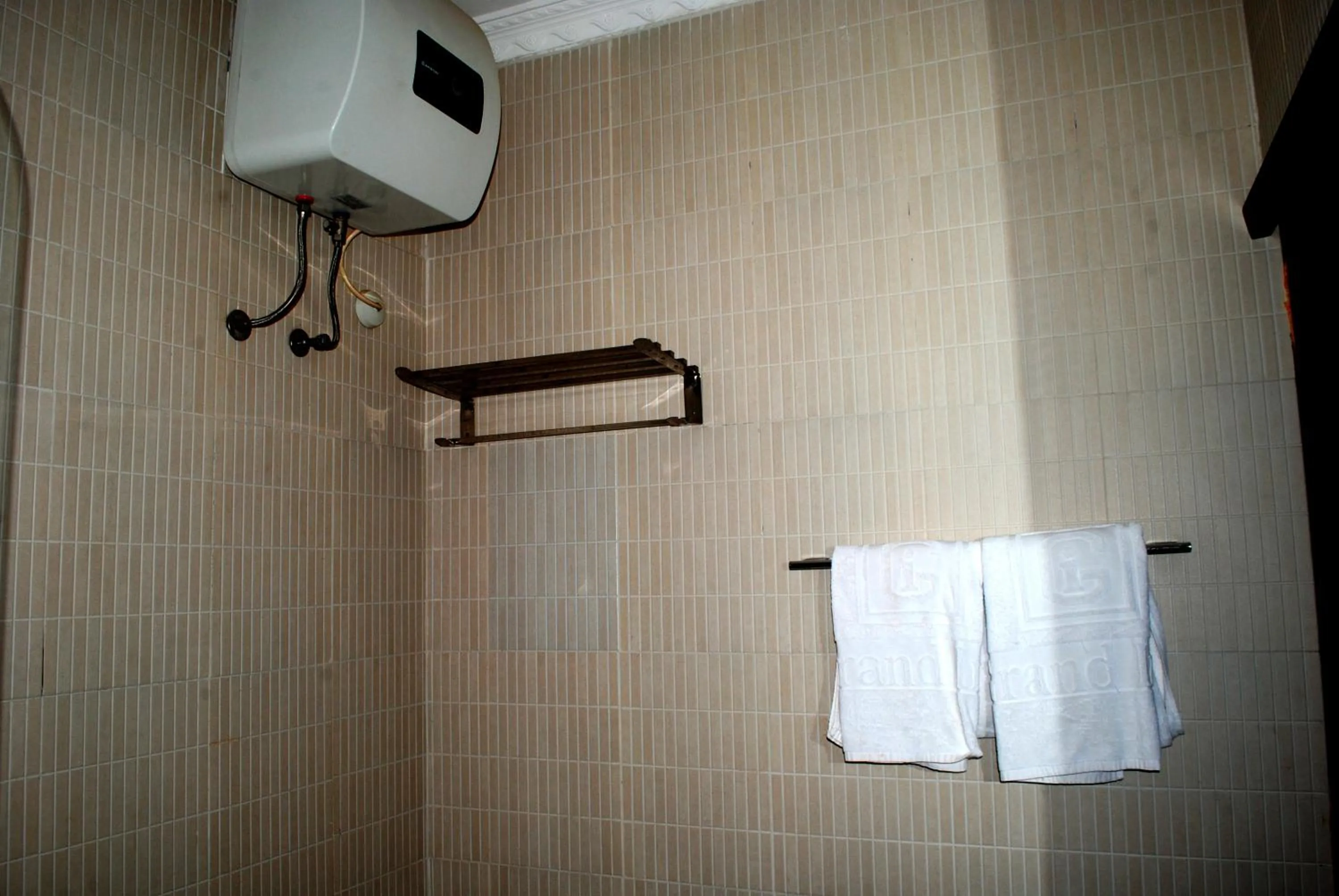 Bathroom in Grand Inn & Suites