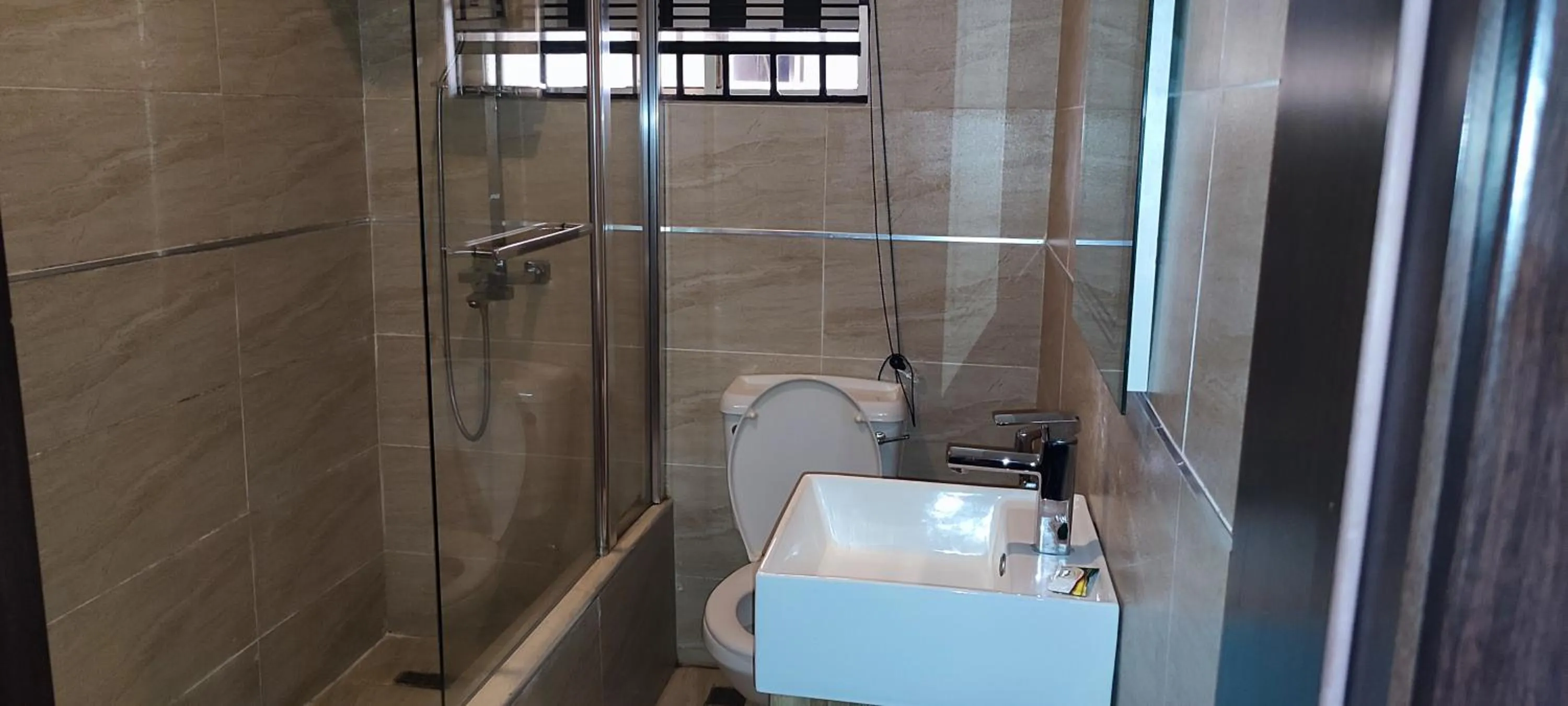 Bathroom in Grand Inn & Suites