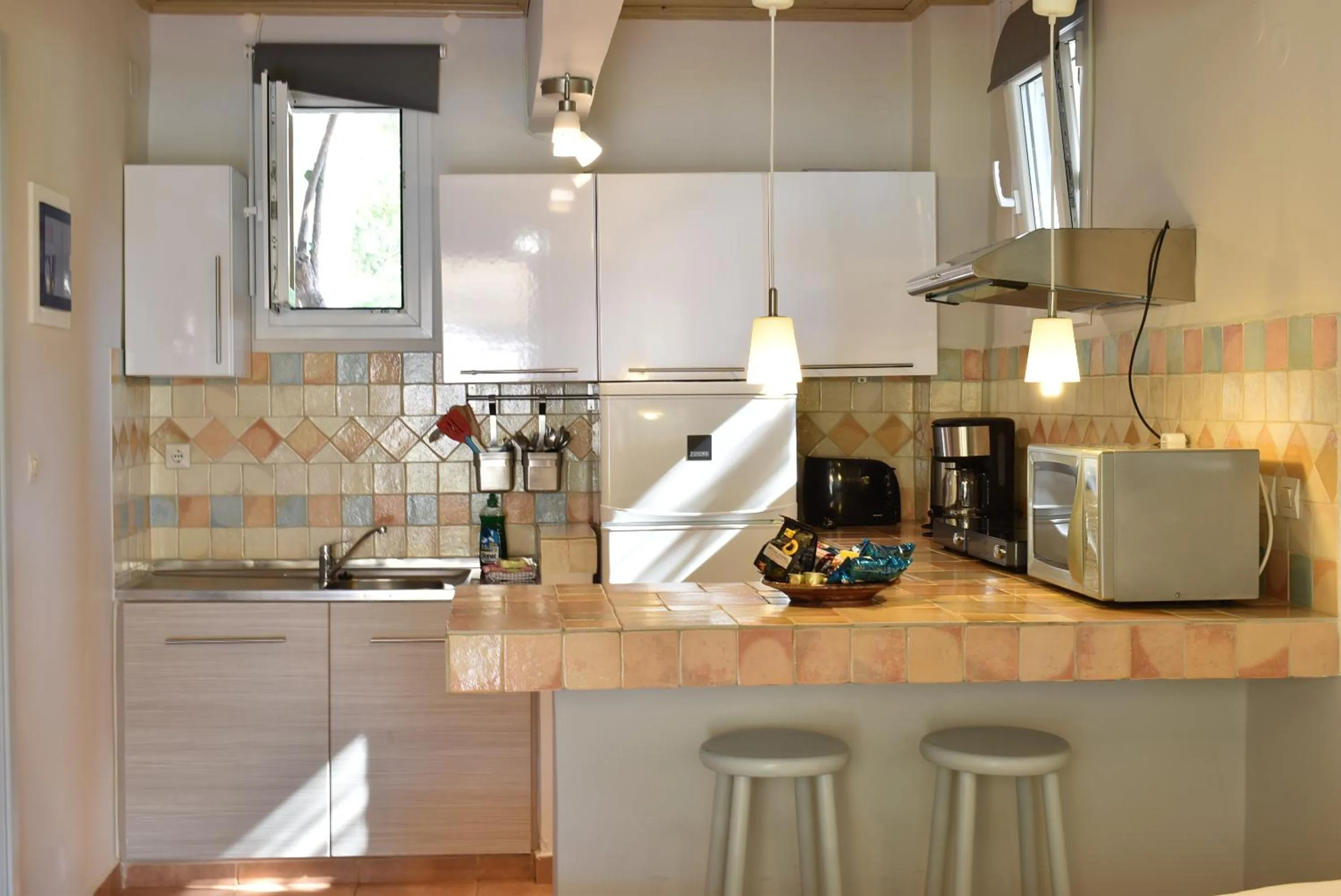 kitchen in Simatos αpARTments & Studios