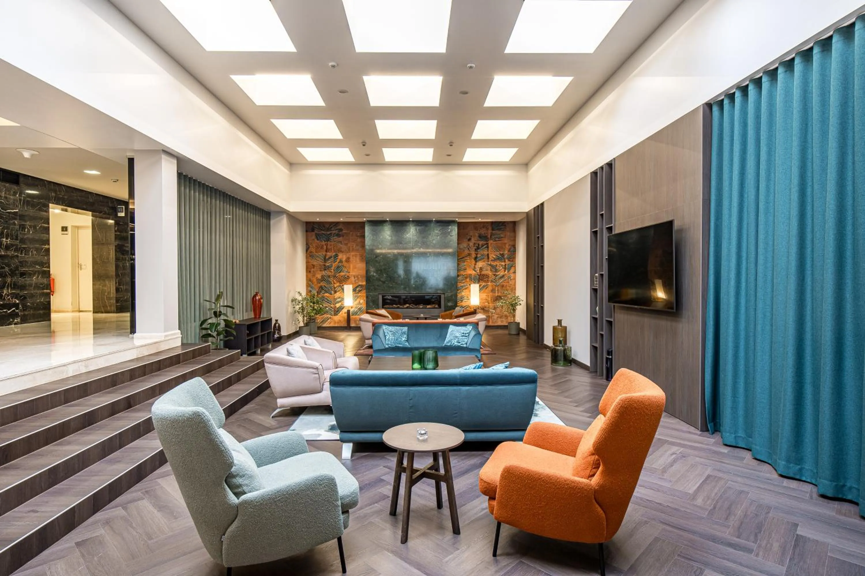 Communal lounge/ TV room in Mercure Palanga Vanagupe Resort & SPA