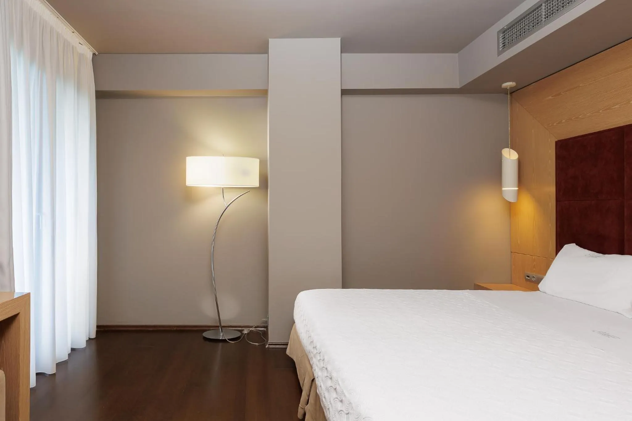 Bed in Elysion Hotel