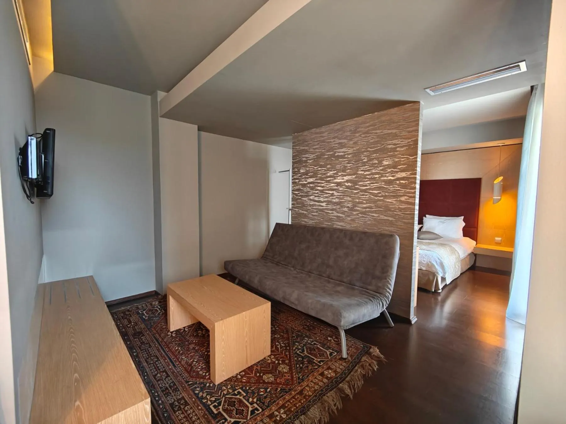 Seating area, Bed in Elysion Hotel