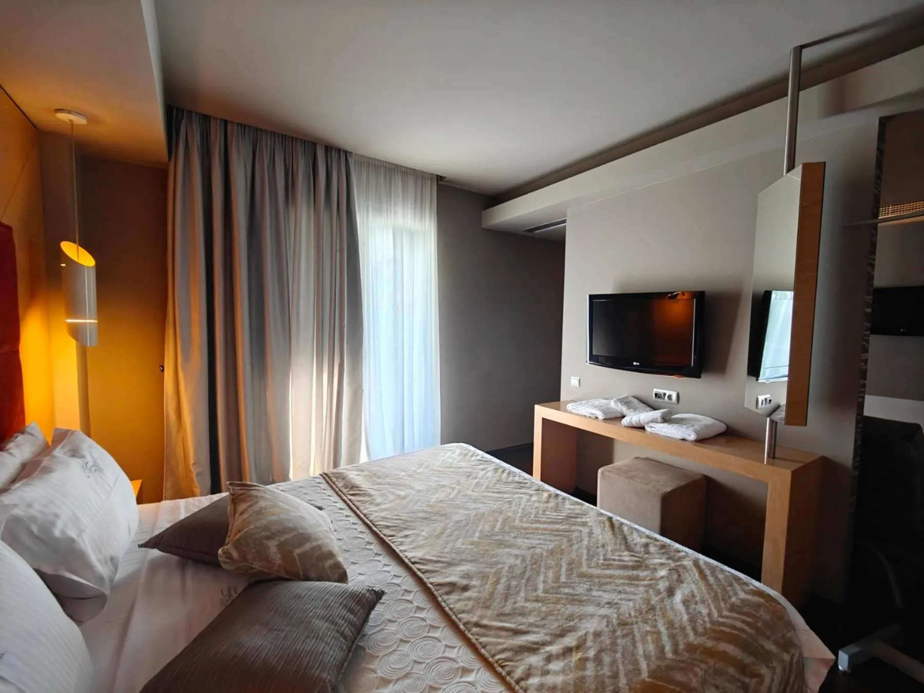 Bed in Elysion Hotel