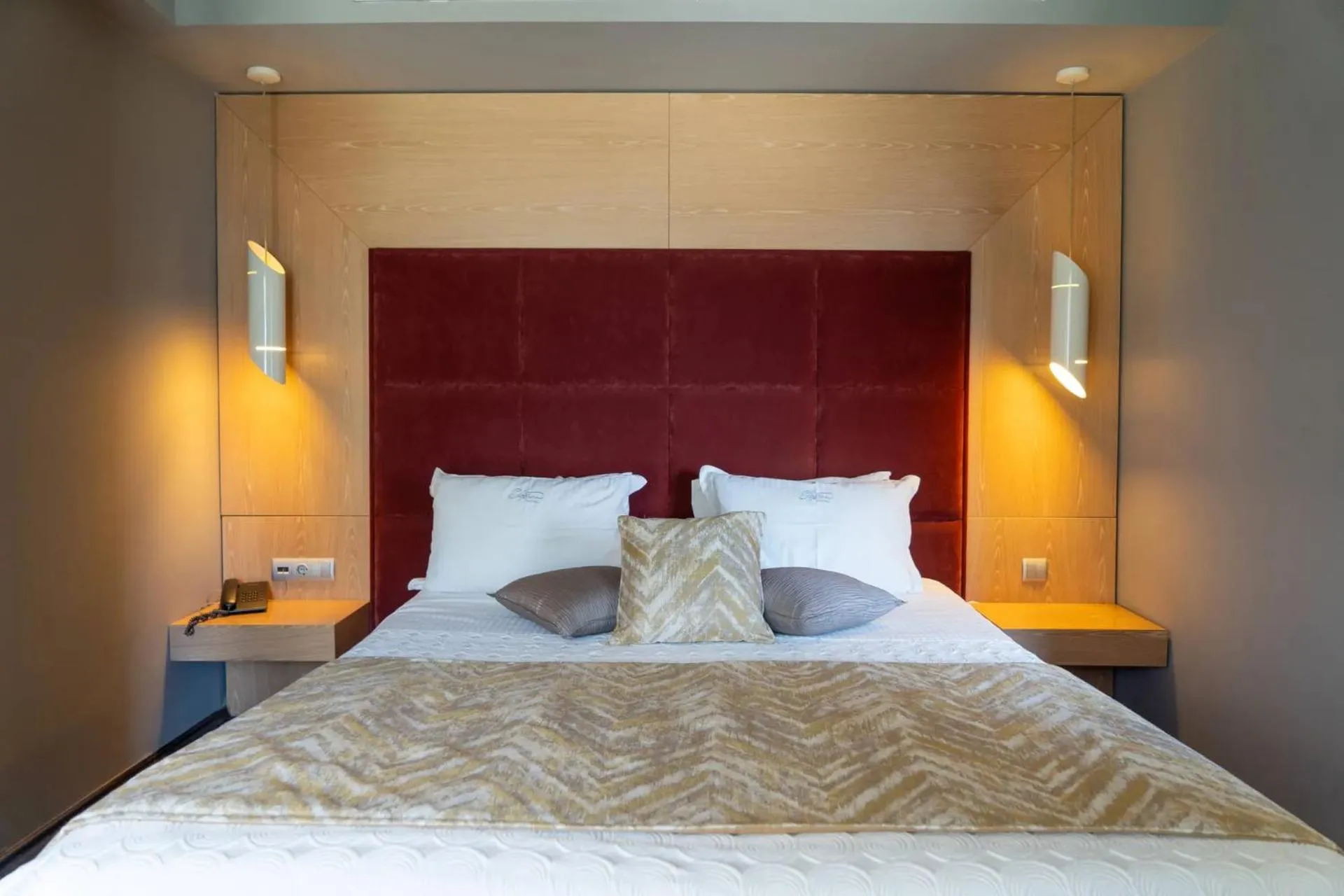 Bed in Elysion Hotel