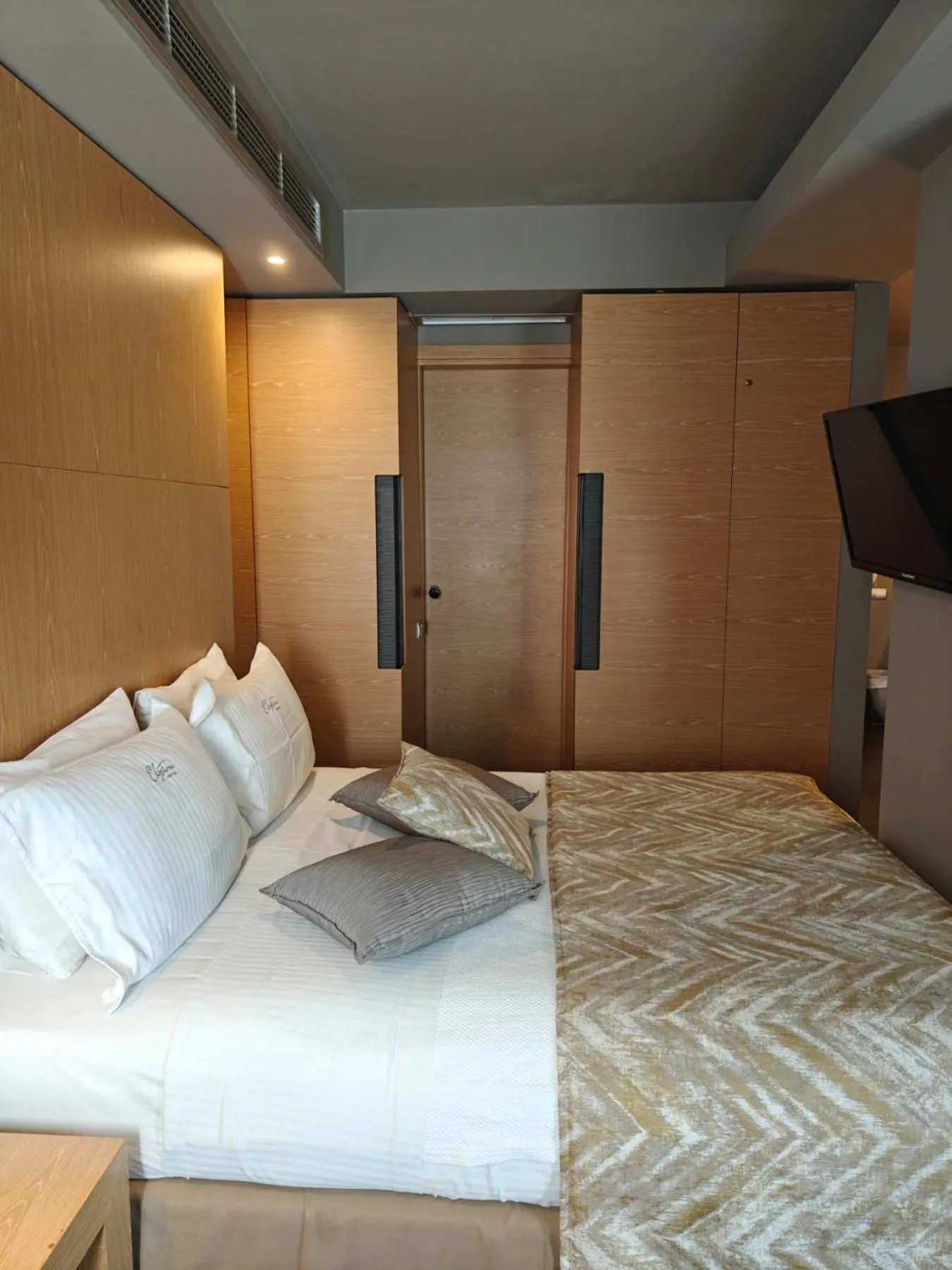 Bed in Elysion Hotel