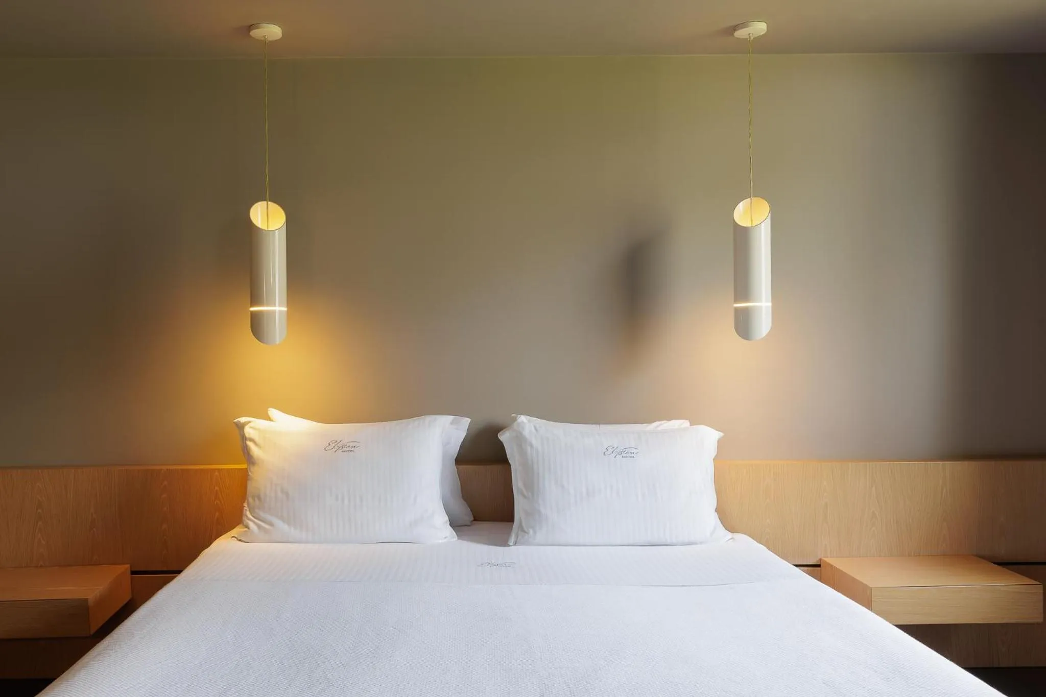 Bed in Elysion Hotel