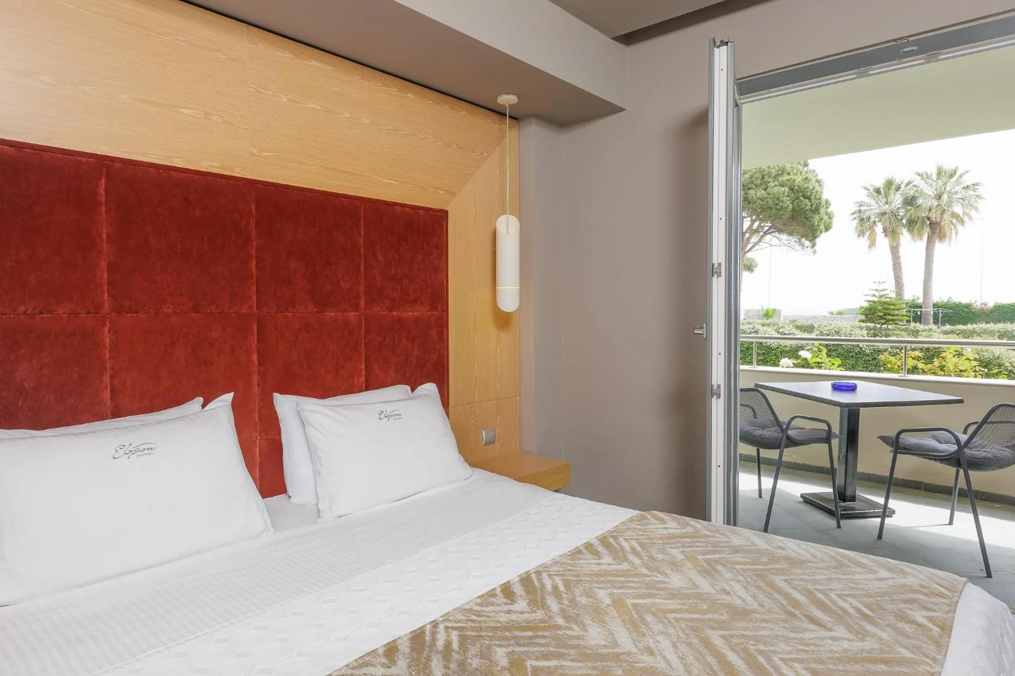 Bed in Elysion Hotel