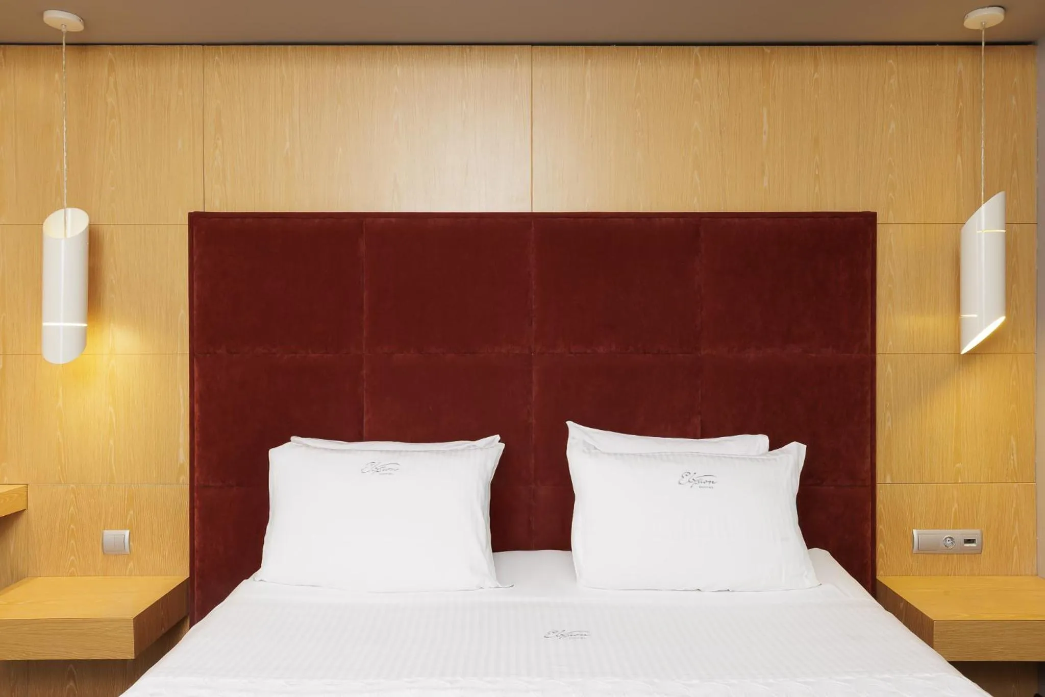 Bed in Elysion Hotel