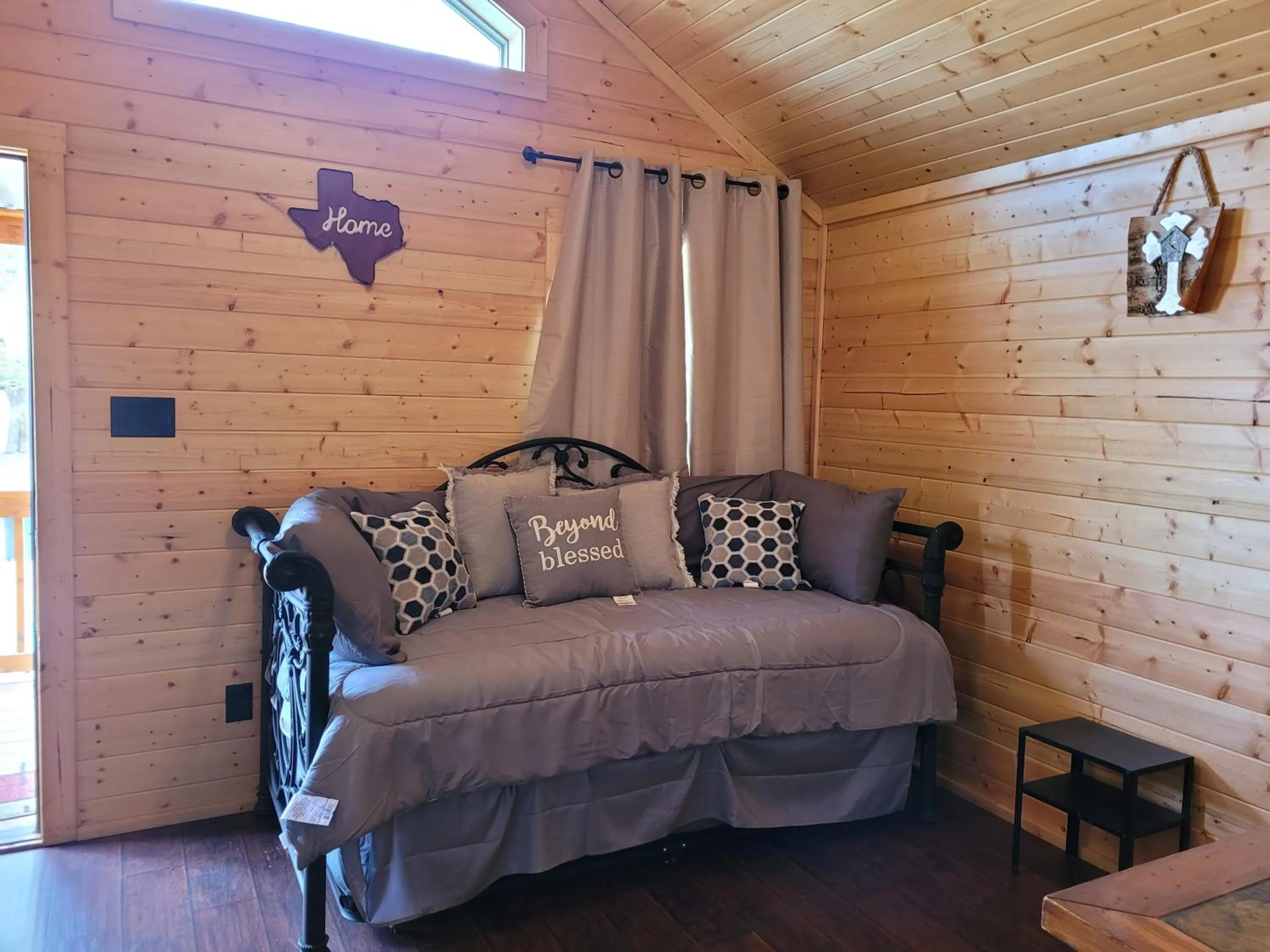 Living room, Bed in Al's Hideaway Cabin and RV Space, LLC