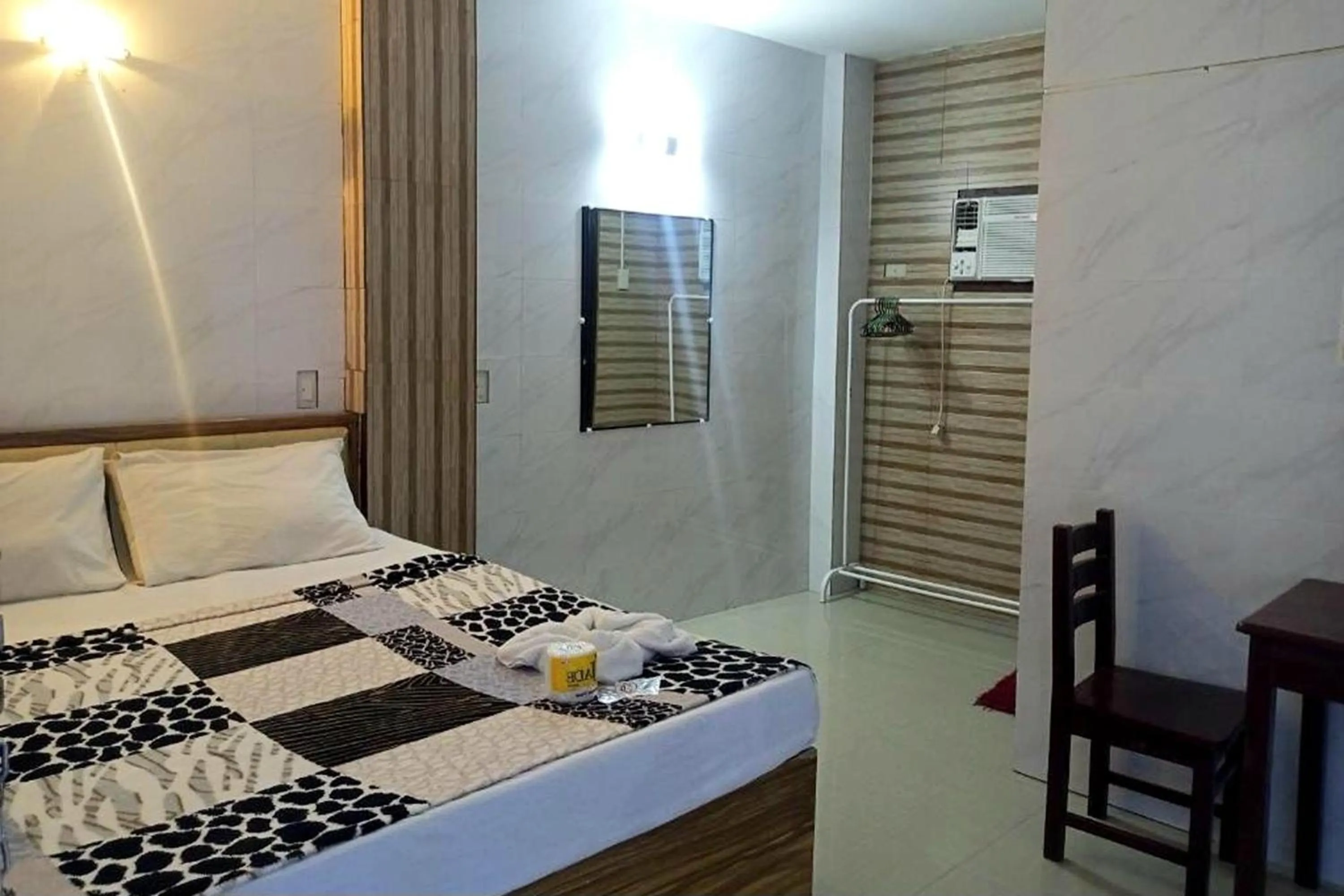 Bed in Casa Del Camba Hotel and Restaurant near Hundred Islands