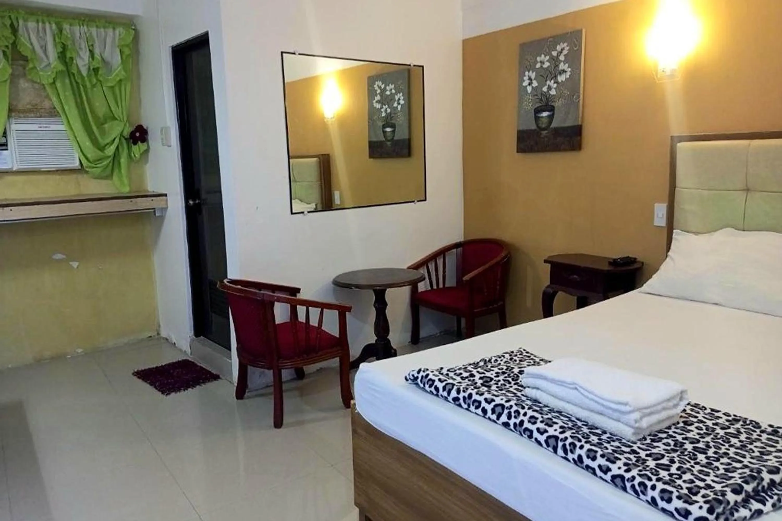 Bed in Casa Del Camba Hotel and Restaurant near Hundred Islands