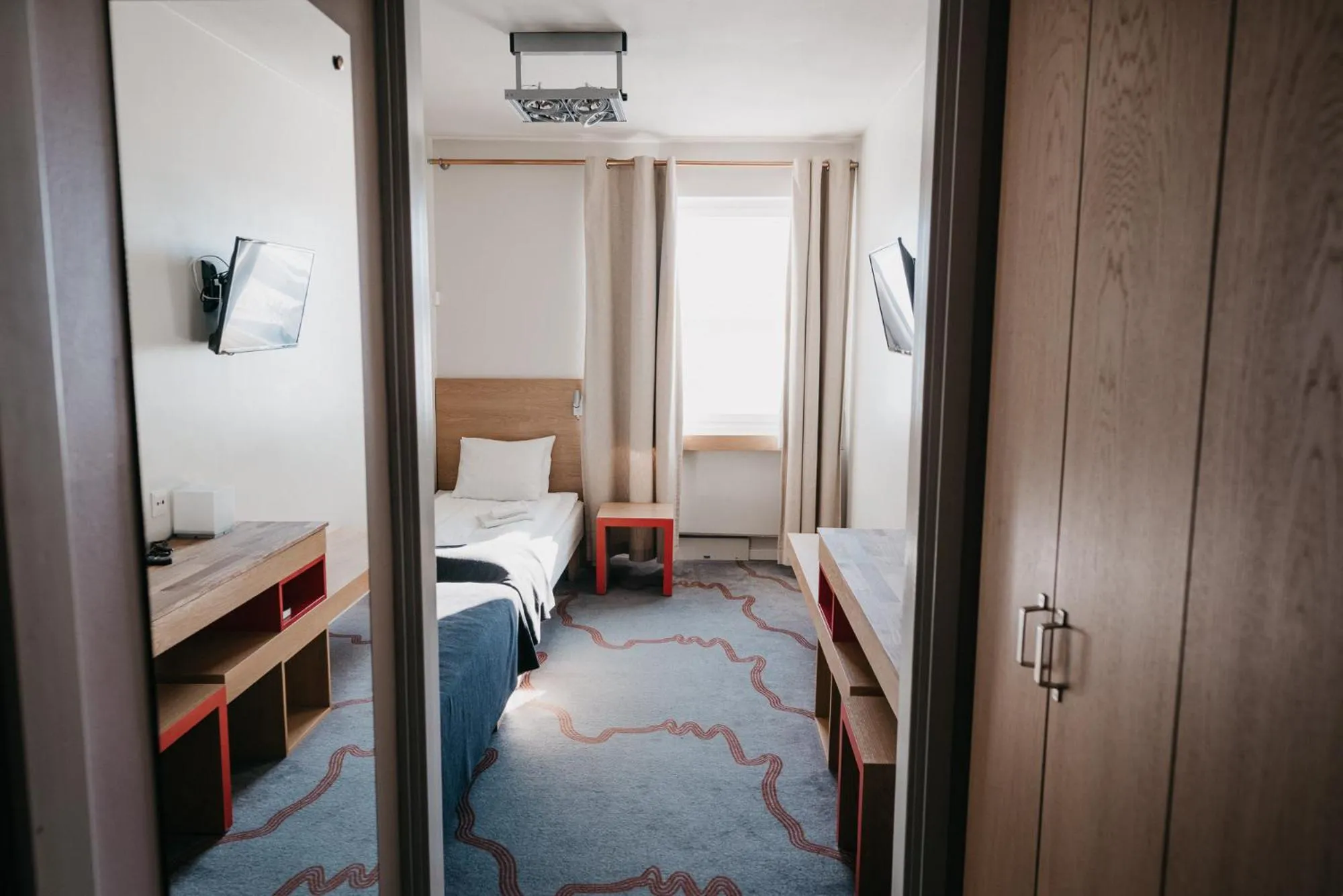 Photo of the whole room, Bed in Tärnaby Fjällhotell