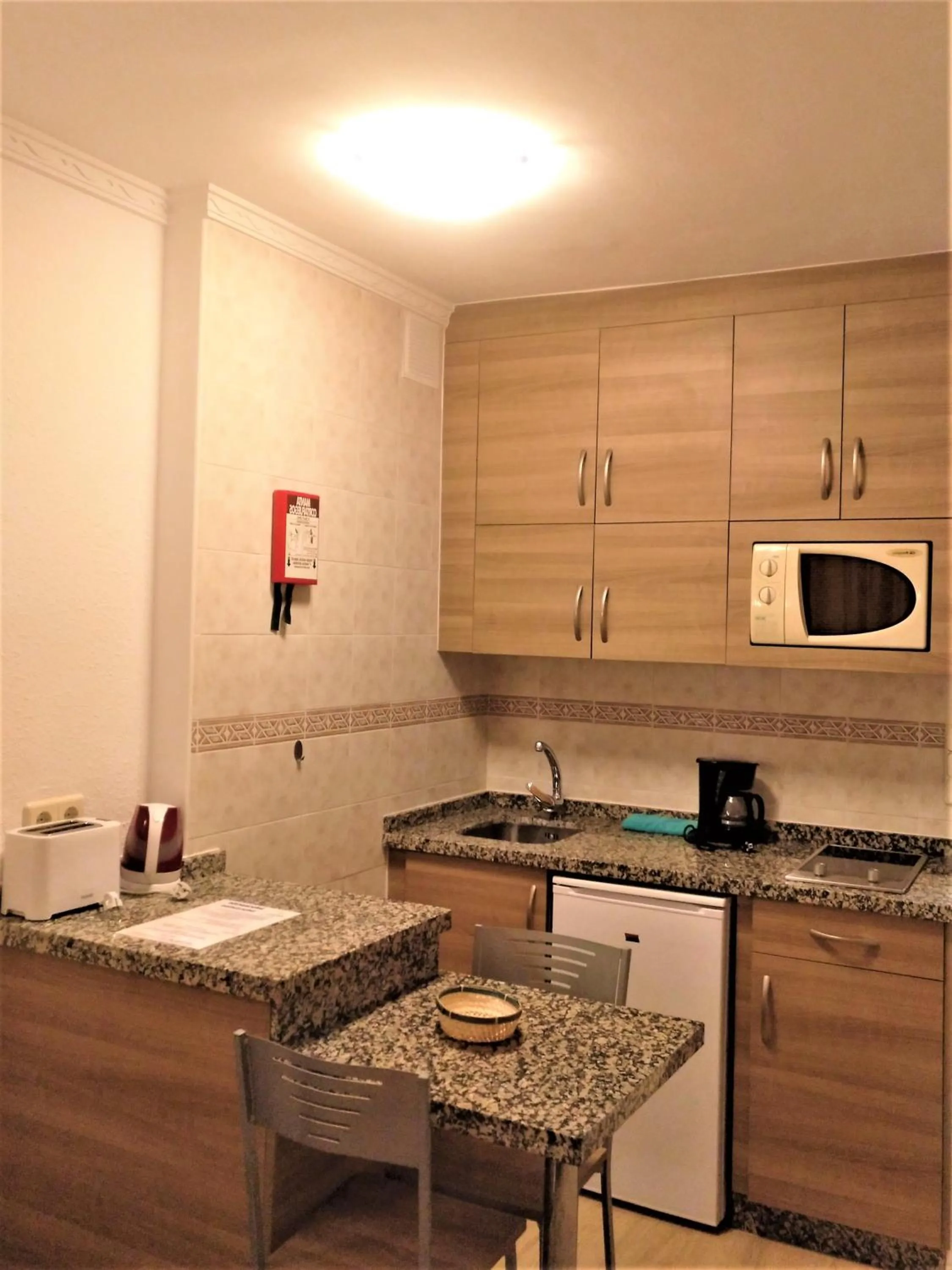 Kitchen or kitchenette in Apartamentos Stella Maris - Marcari SL