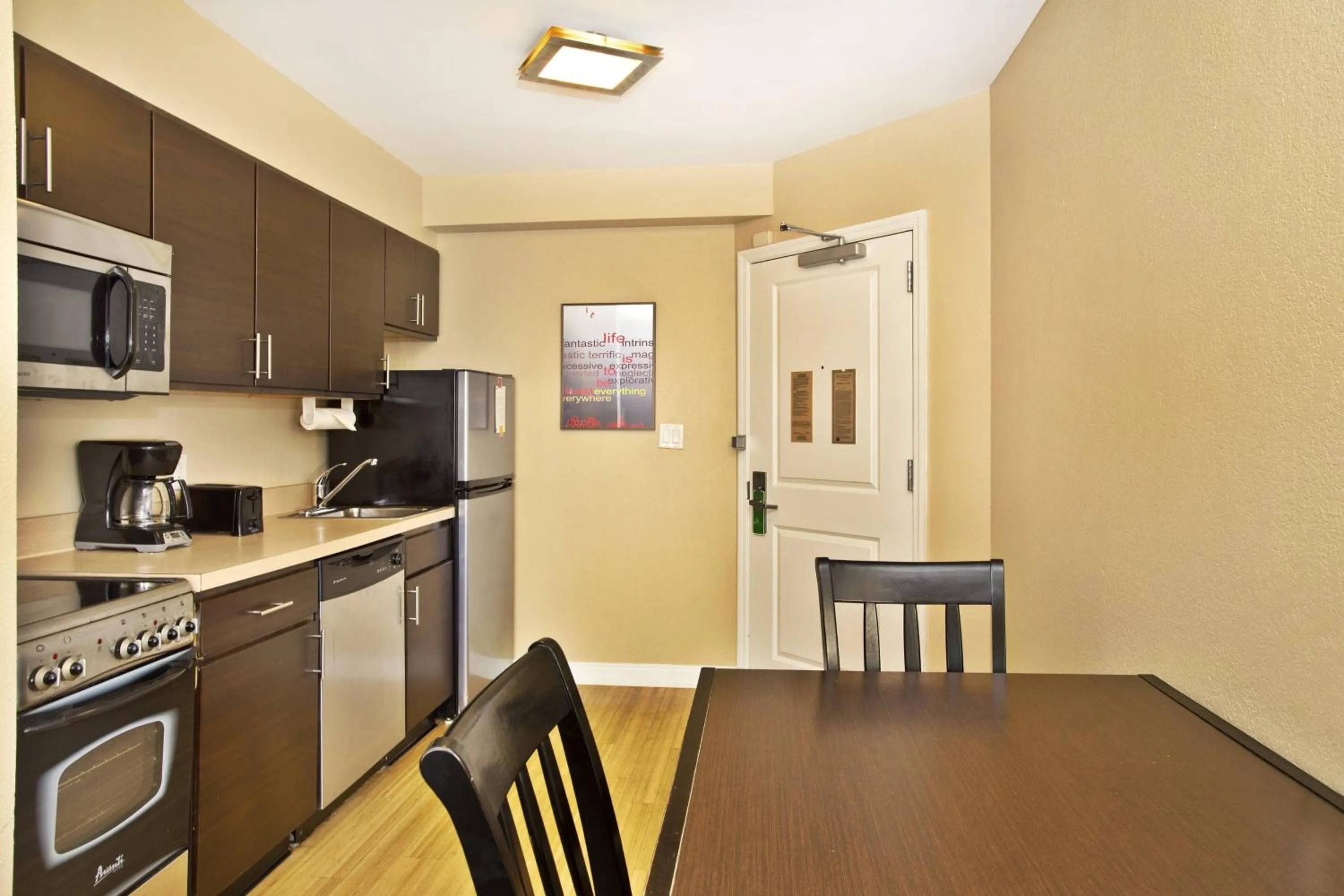 Kitchen or kitchenette in TownePlace Suites Republic Airport Long Island Farmingdale