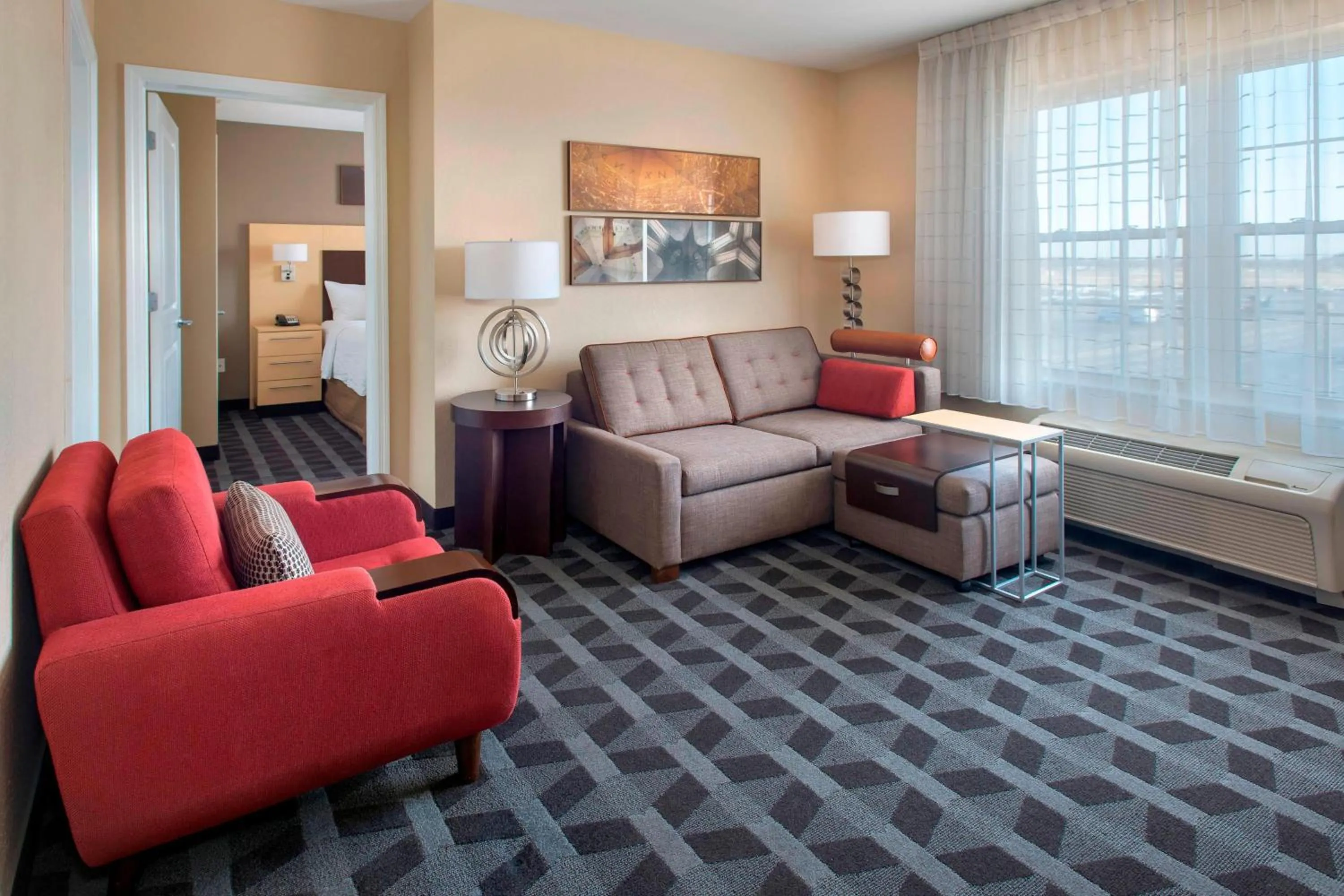 Living room in TownePlace Suites Republic Airport Long Island Farmingdale
