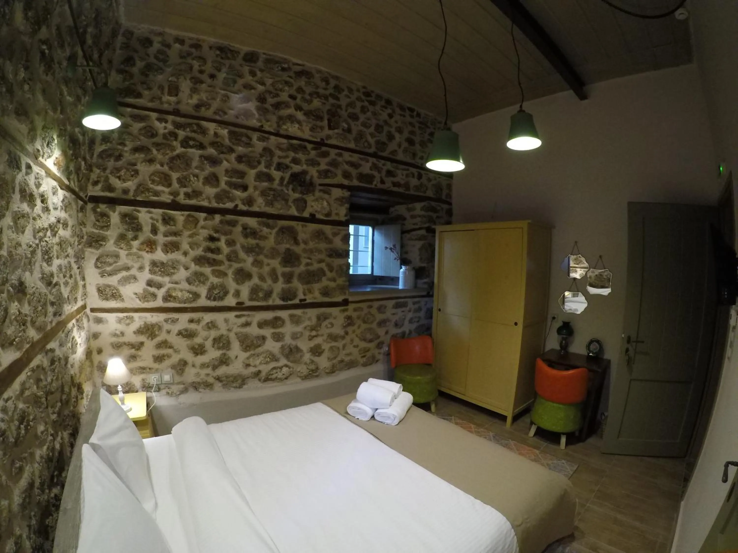 Bed in Bayiri Petit Pension