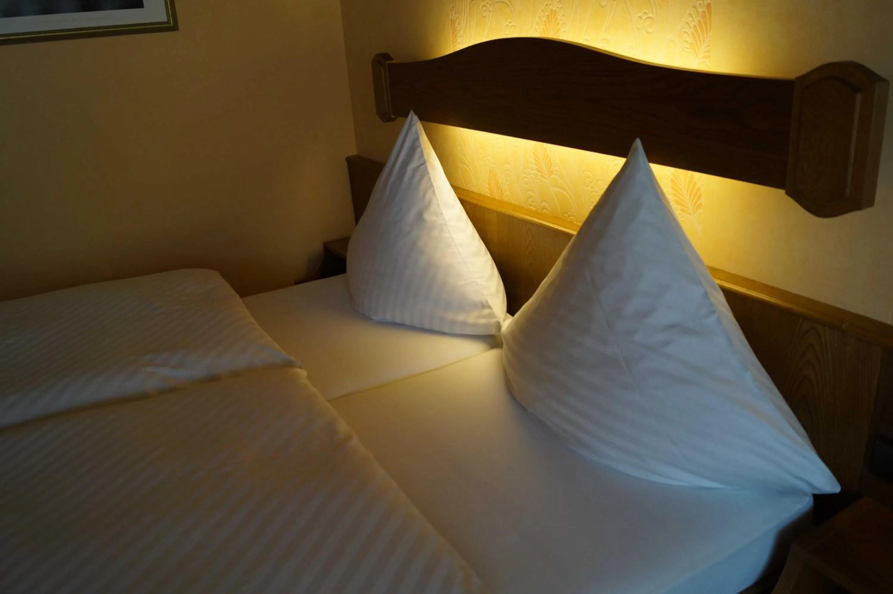 Bed in Cafe Best Gaestezimmer