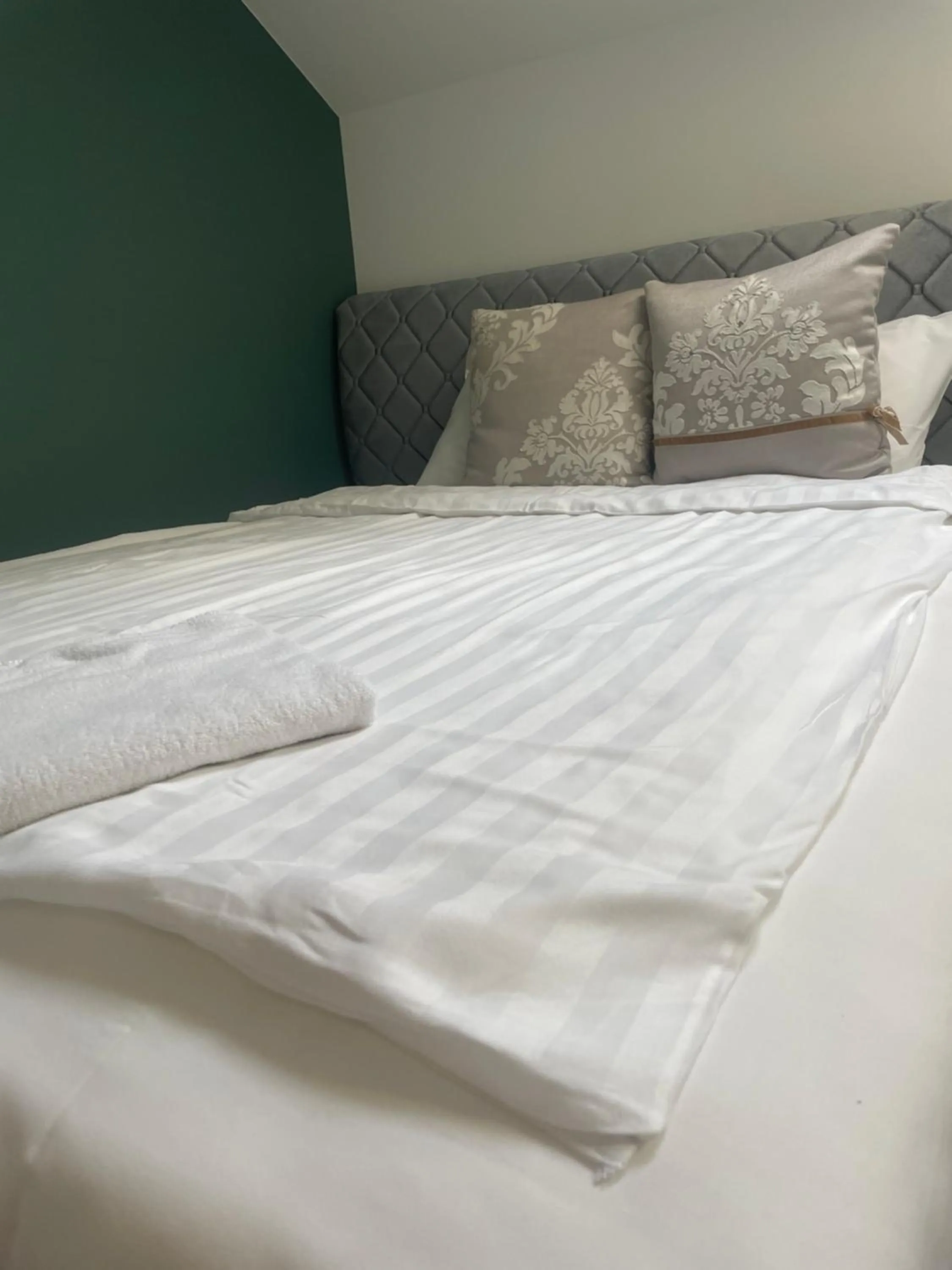 Bed in Apple Economy Hotel