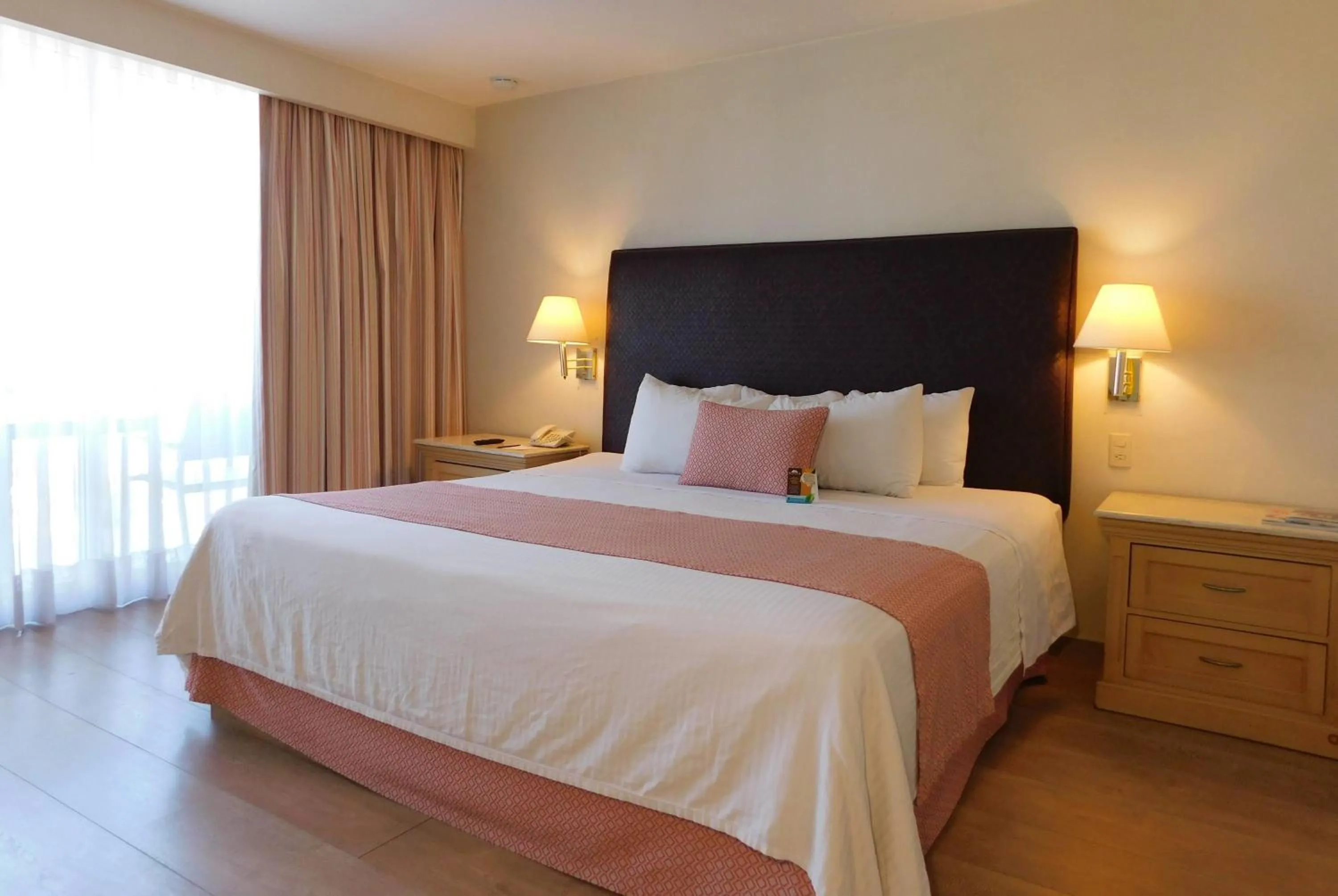 Photo of the whole room, Bed in Hotel Palacio Azteca Tijuana, Trademark by Wyndham