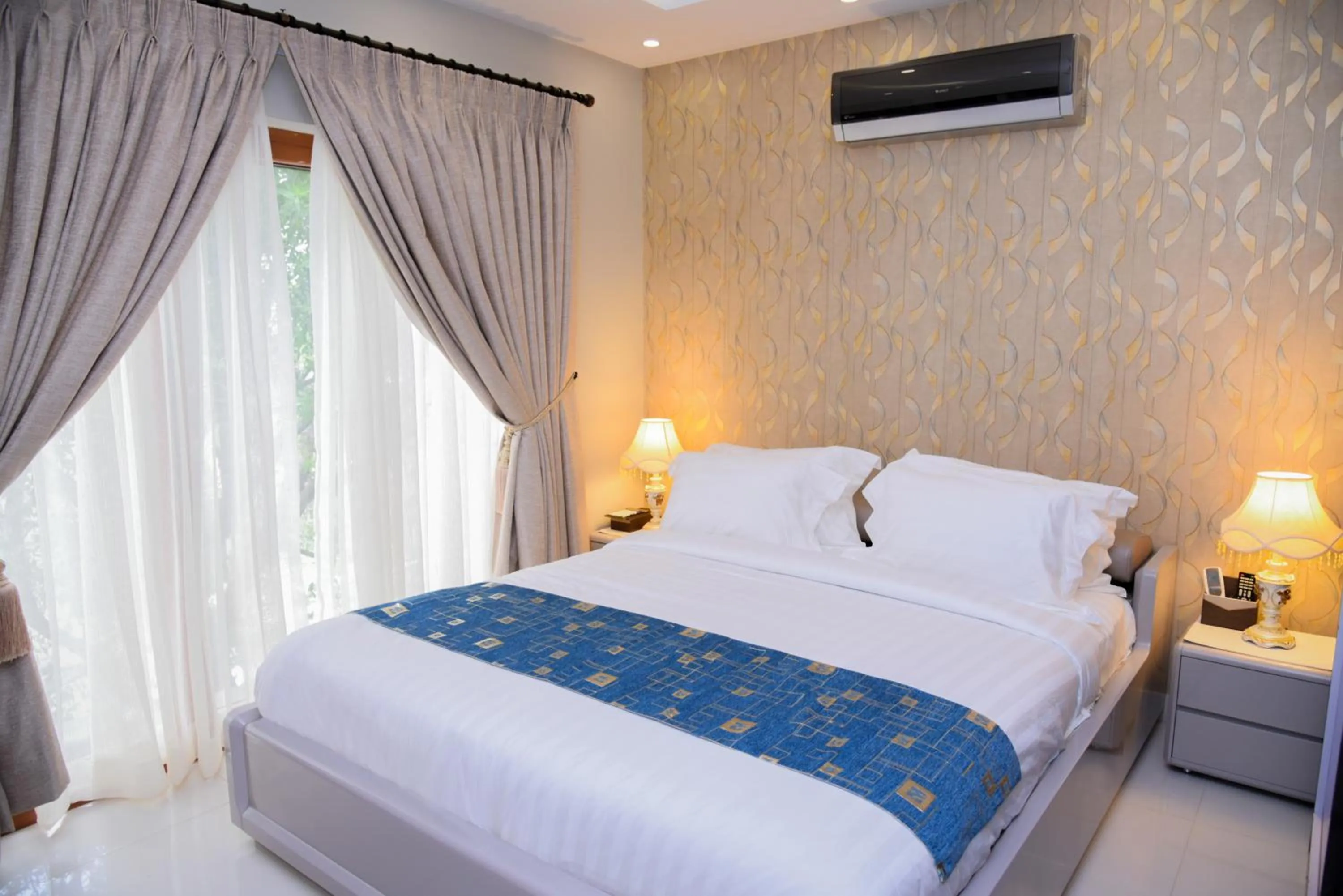 Bedroom in Orchards Cottage Hotel