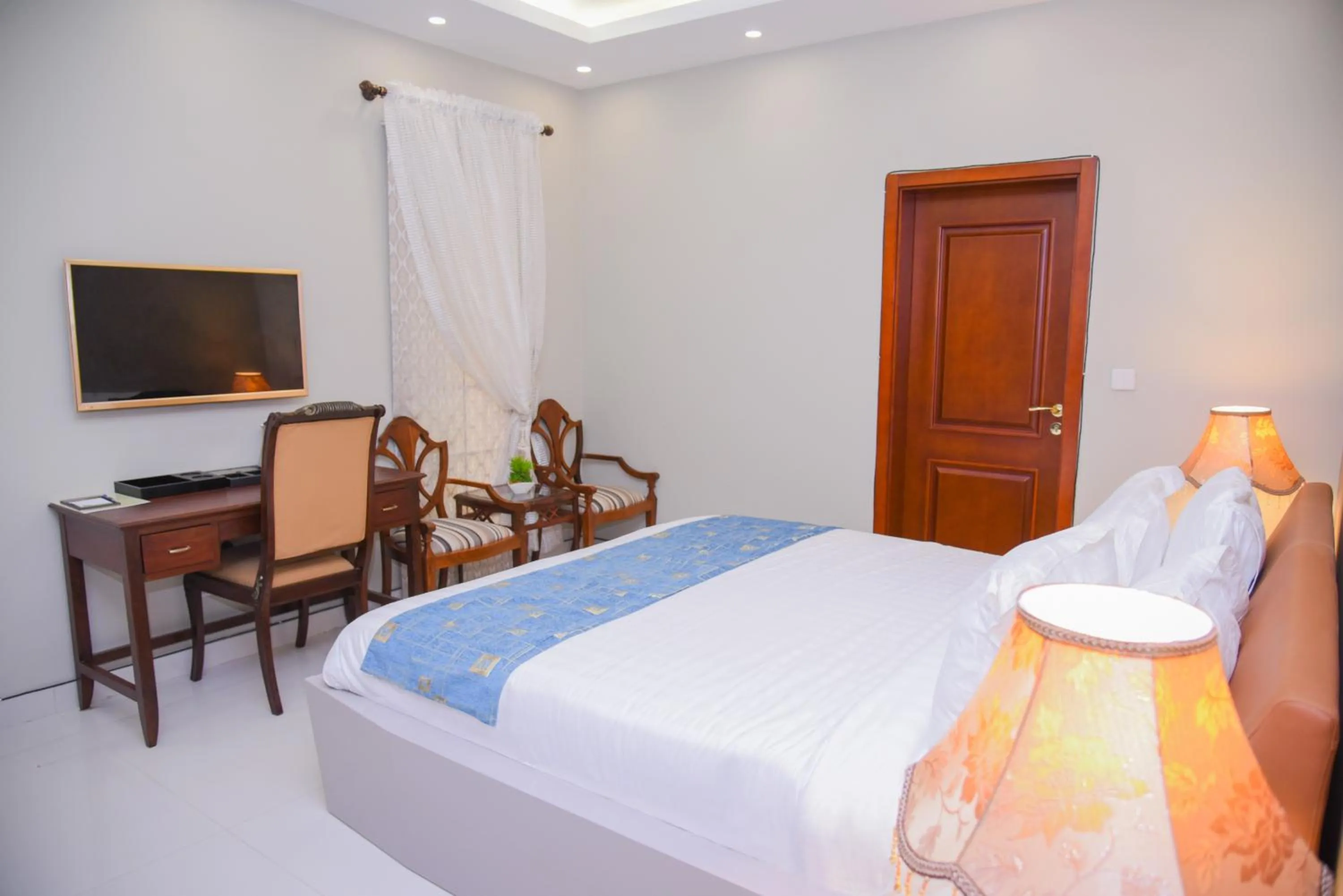 Bed in Orchards Cottage Hotel