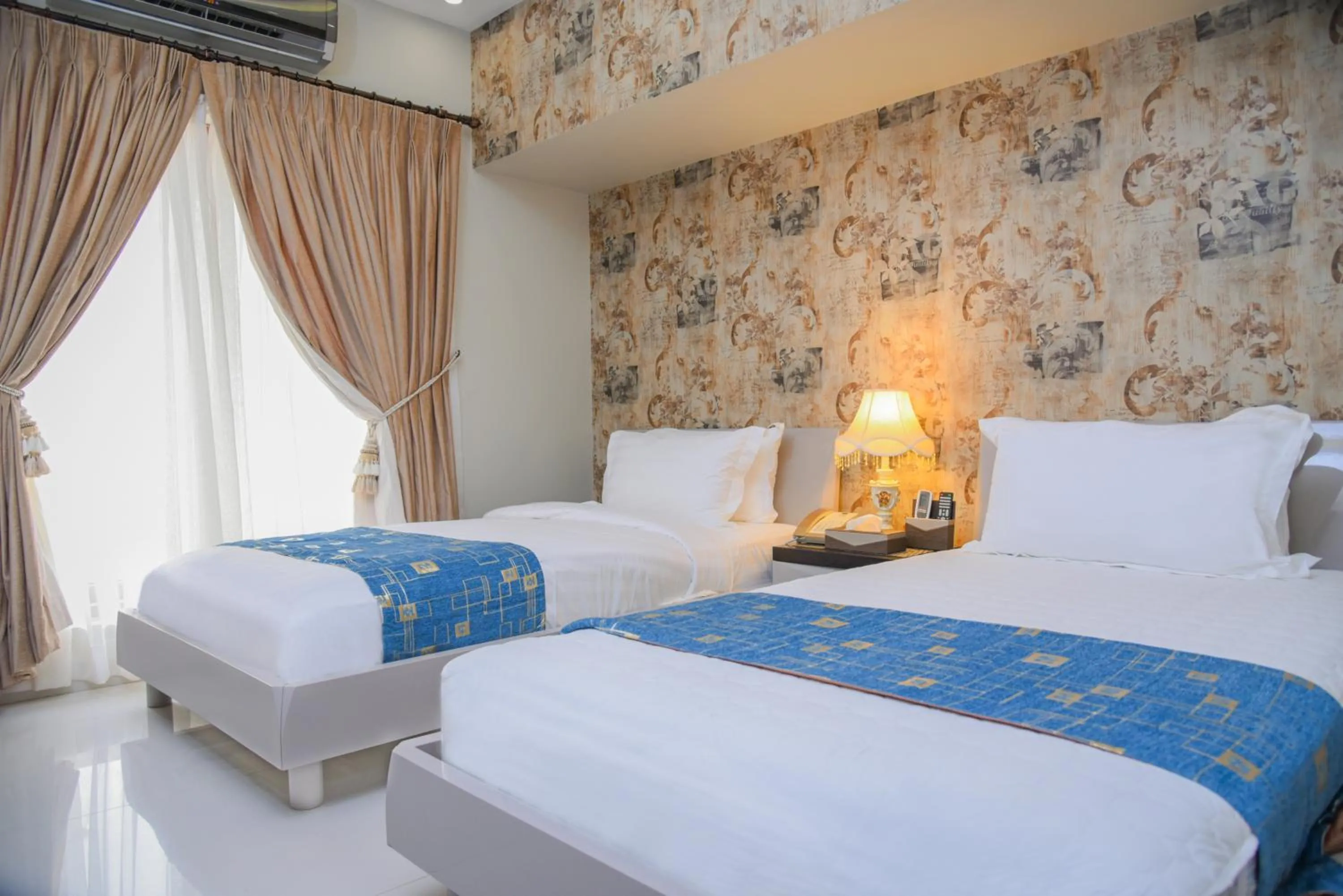 Bed in Orchards Cottage Hotel