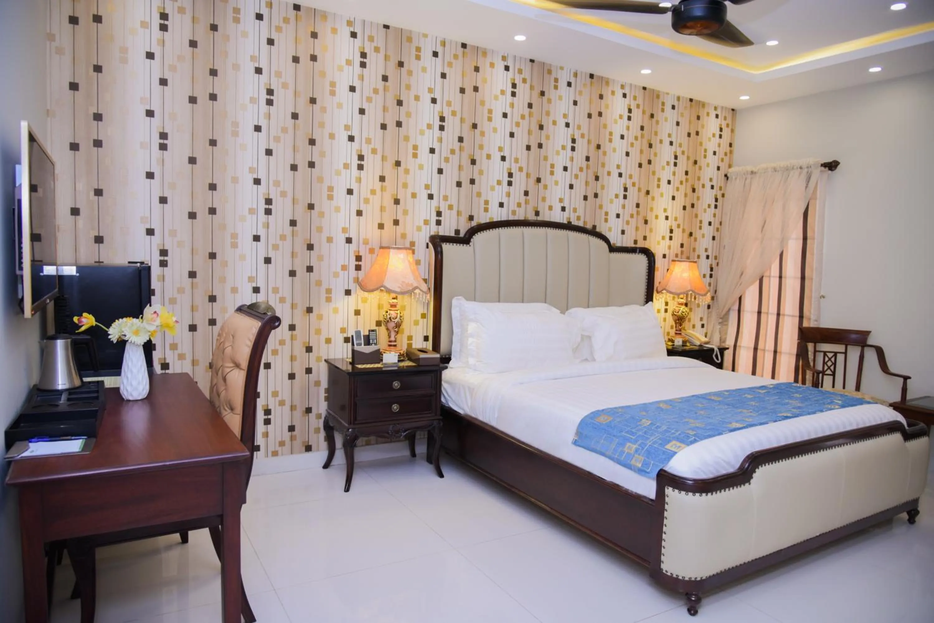 Bed in Orchards Cottage Hotel