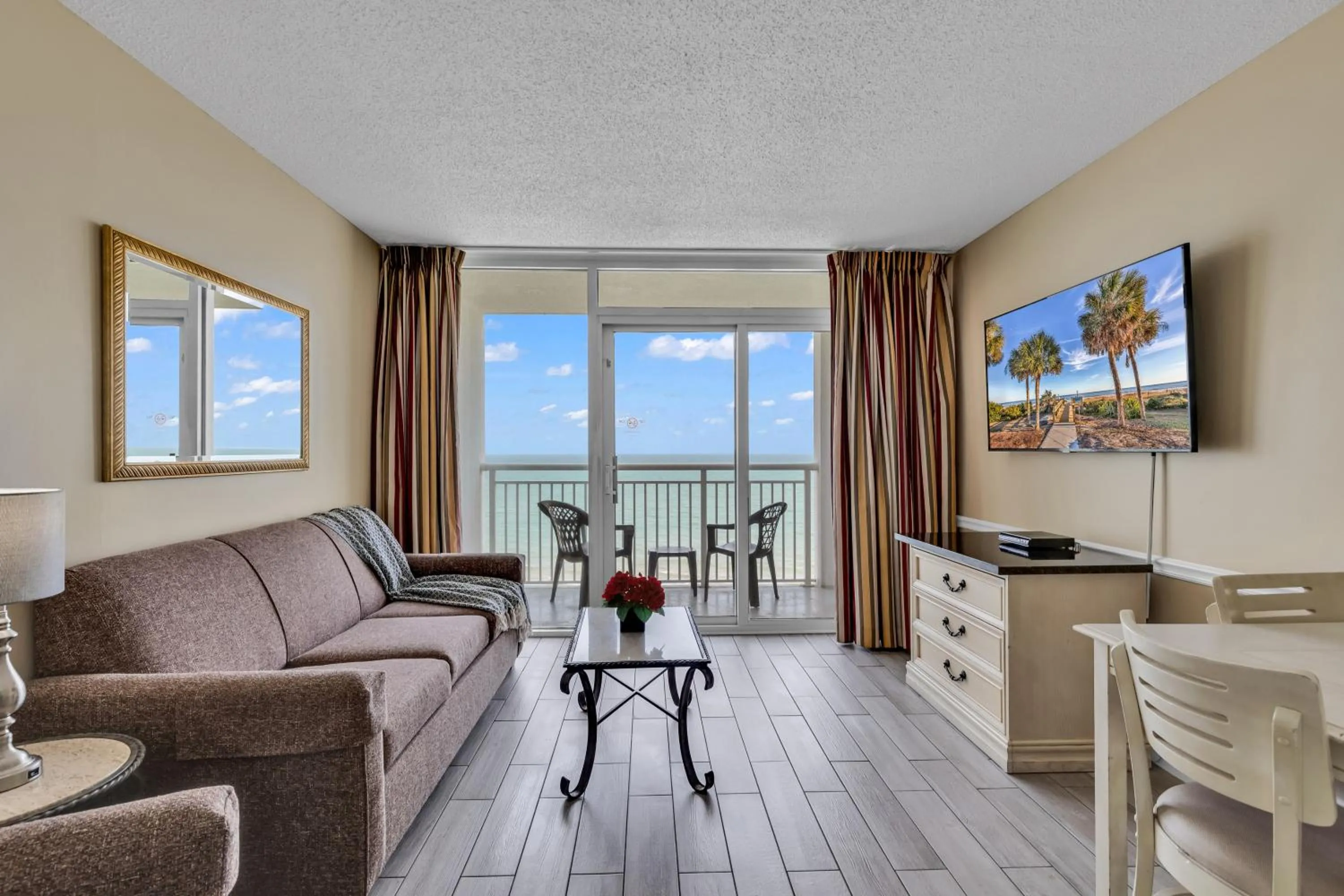 Living room in Oceanfront Condo Camelot By the Sea