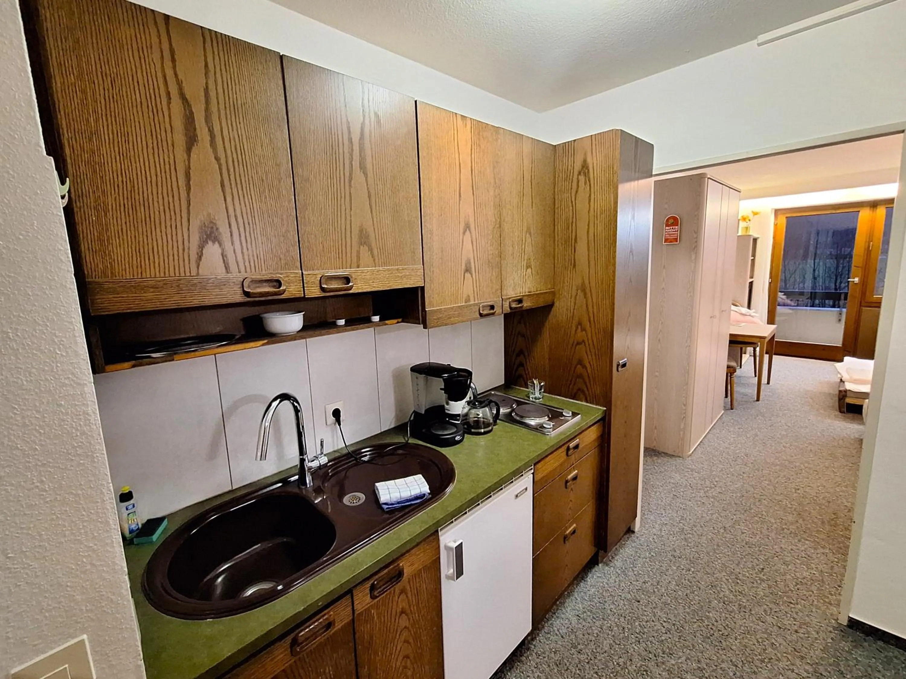 Kitchen or kitchenette in Hotel Quellenhof - Self-Check-in
