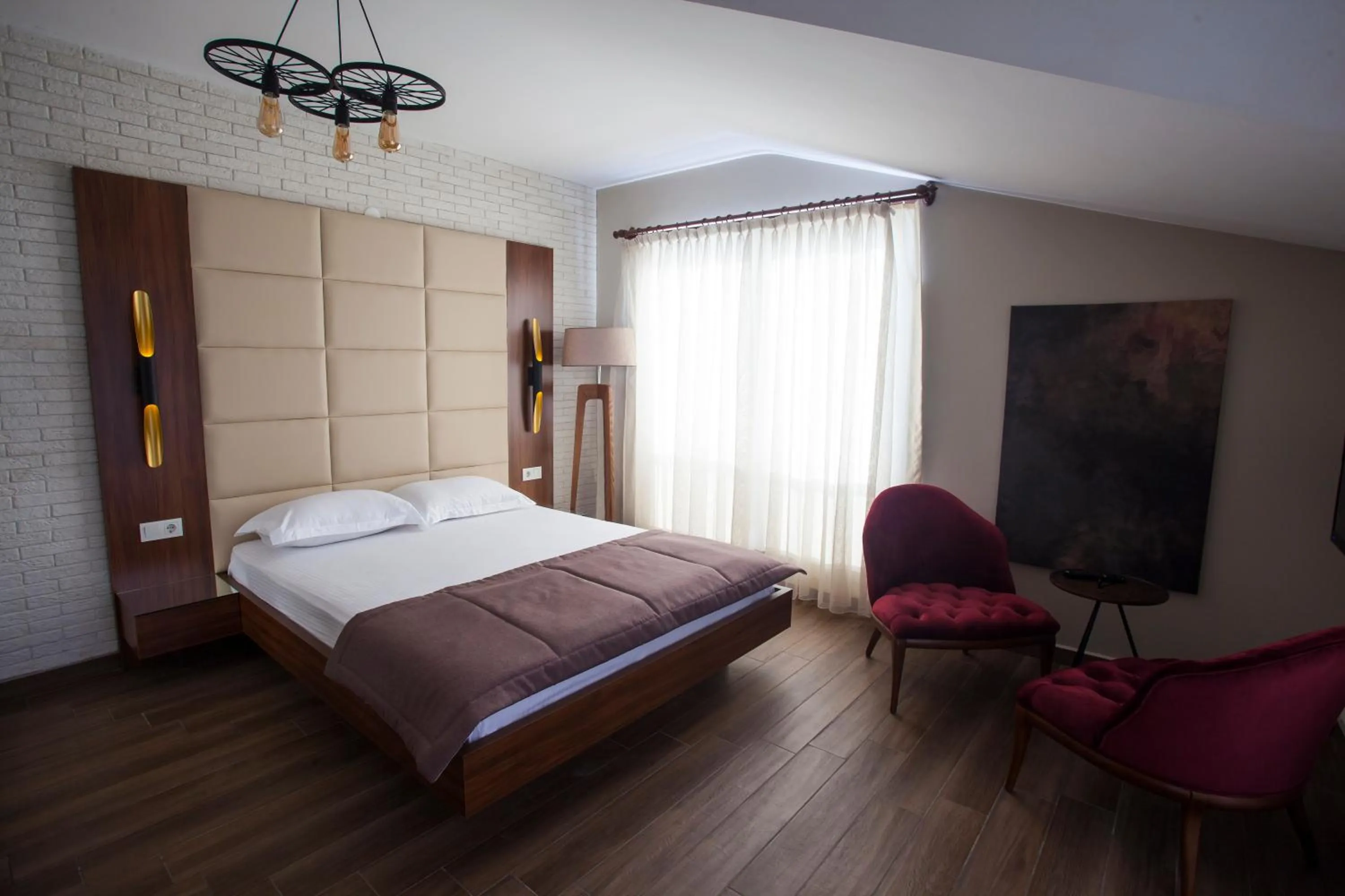 Bed in Maxuite Hotel in Home