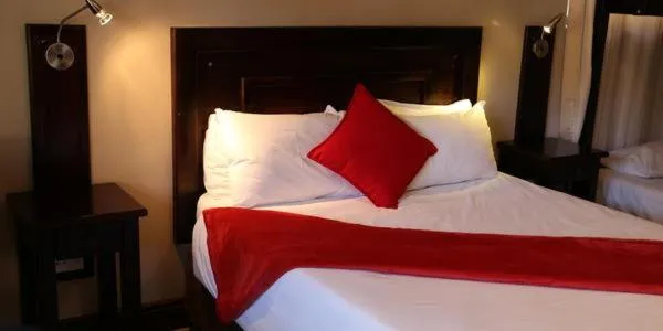 Bed in Klein Windhoek Guesthouse