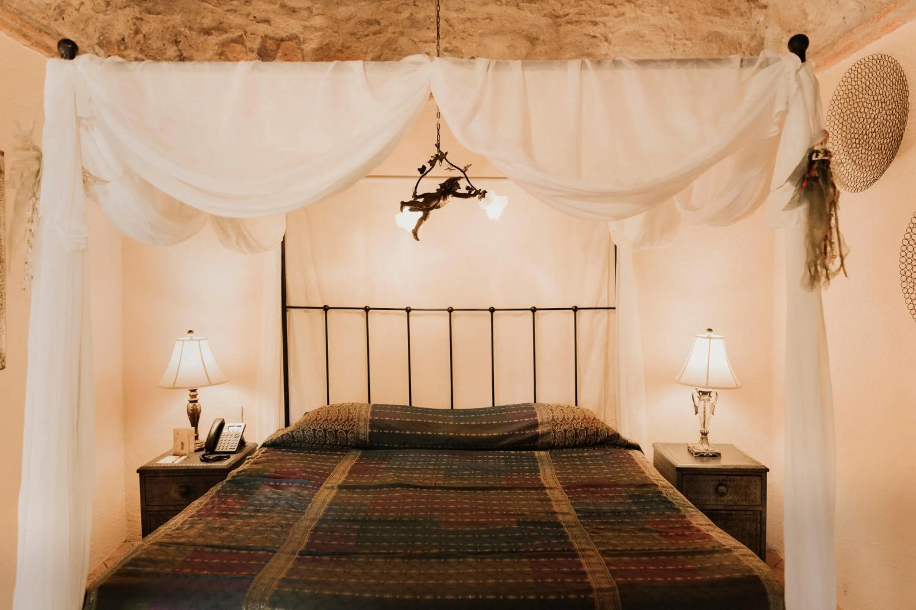 Bed in Hacienda Sepulveda Hotel & Spa