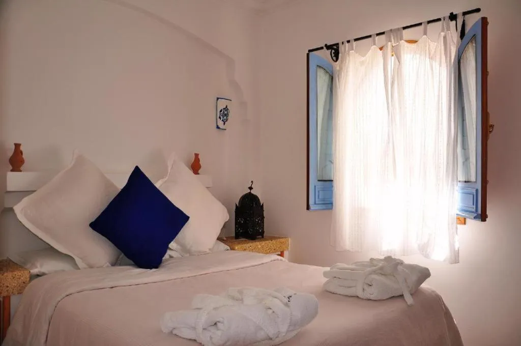 Bed in Hotel Al Alba Hammam & Restaurant