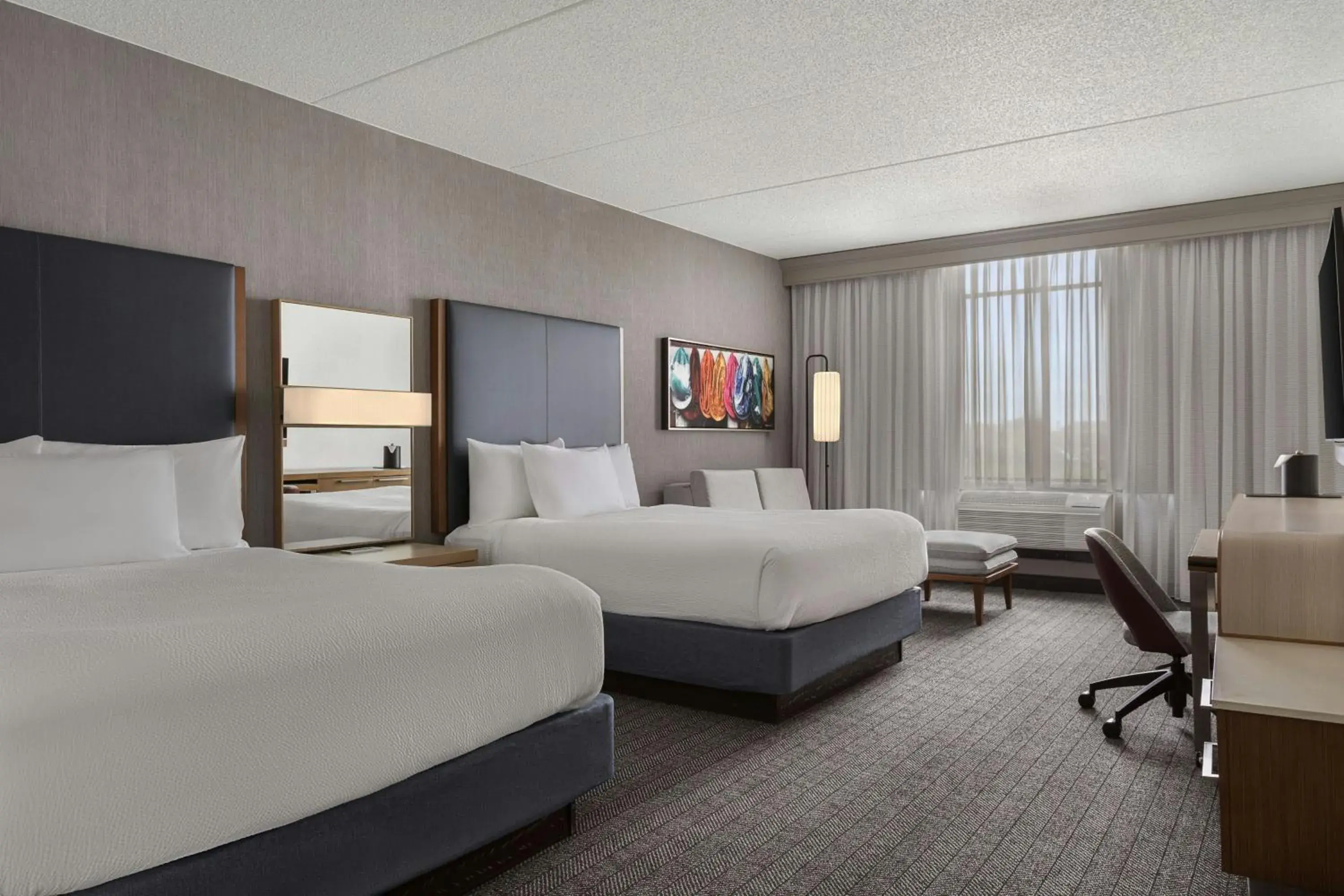 Executive Queen Room with Two Queen Beds and Sofa Bed in Courtyard Louisville Airport Executive Queen Room with Two Queen Beds and Sofa Bed in Courtyard Louisville Airport