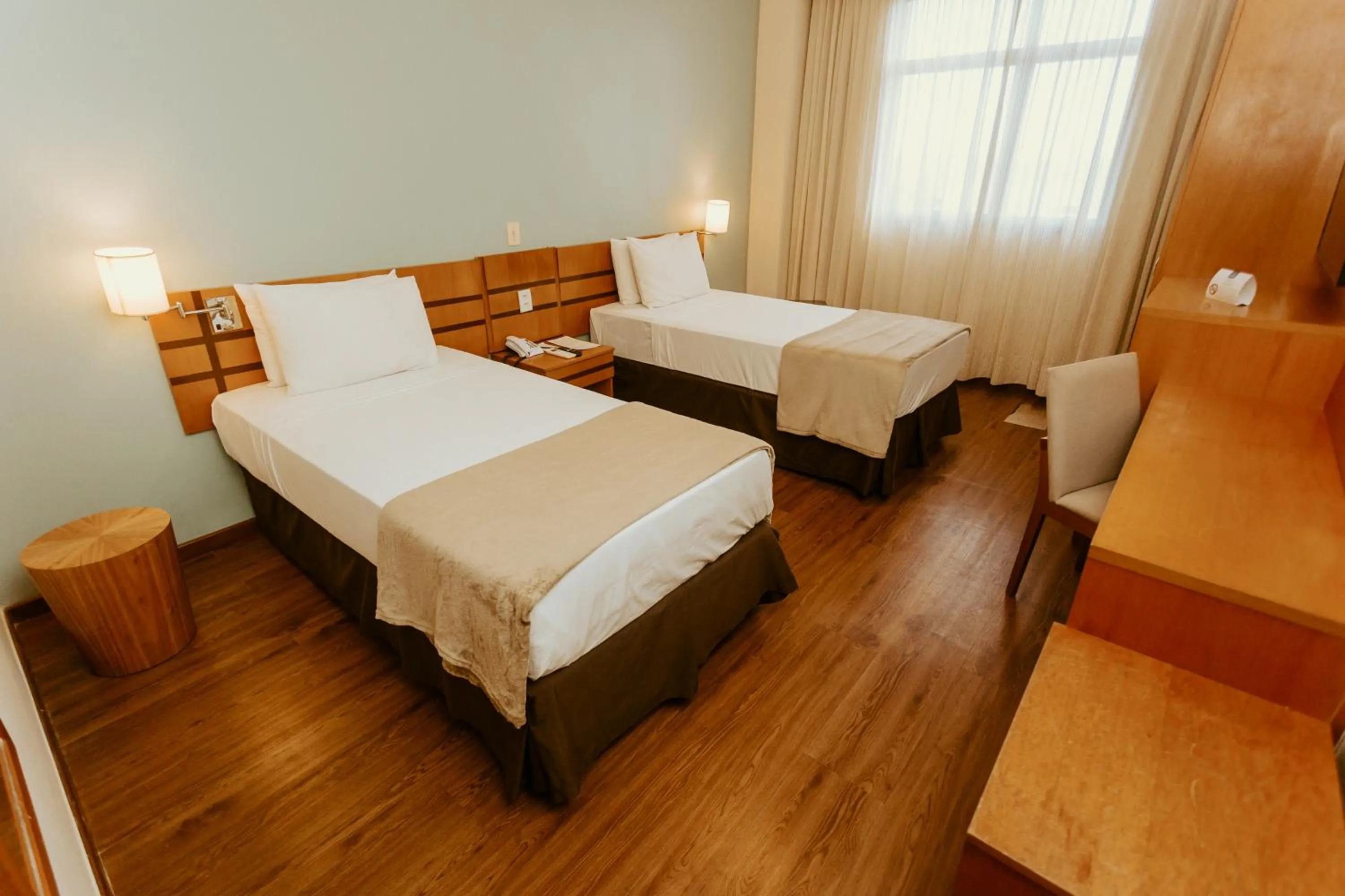 Photo of the whole room, Bed in Vitoria Praia Hotel