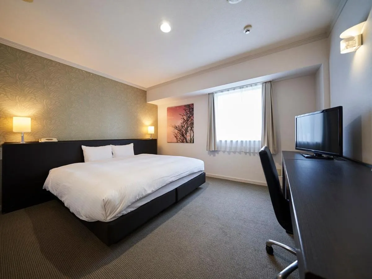 Bed in Hotel Global View Sapporo Old Hotel Royal Stay Sapporo