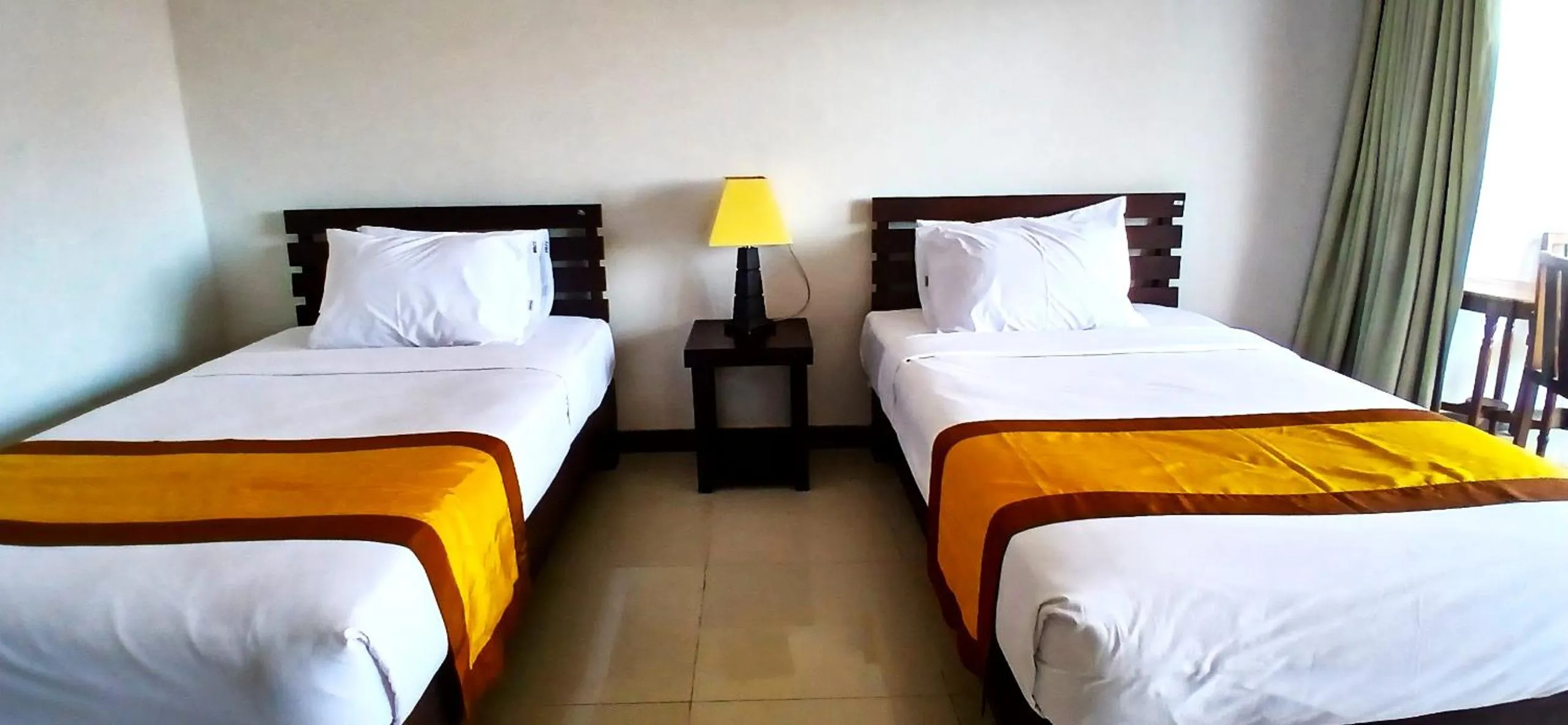 Property building, Bed in Nirmala Hotel & Convention Centre
