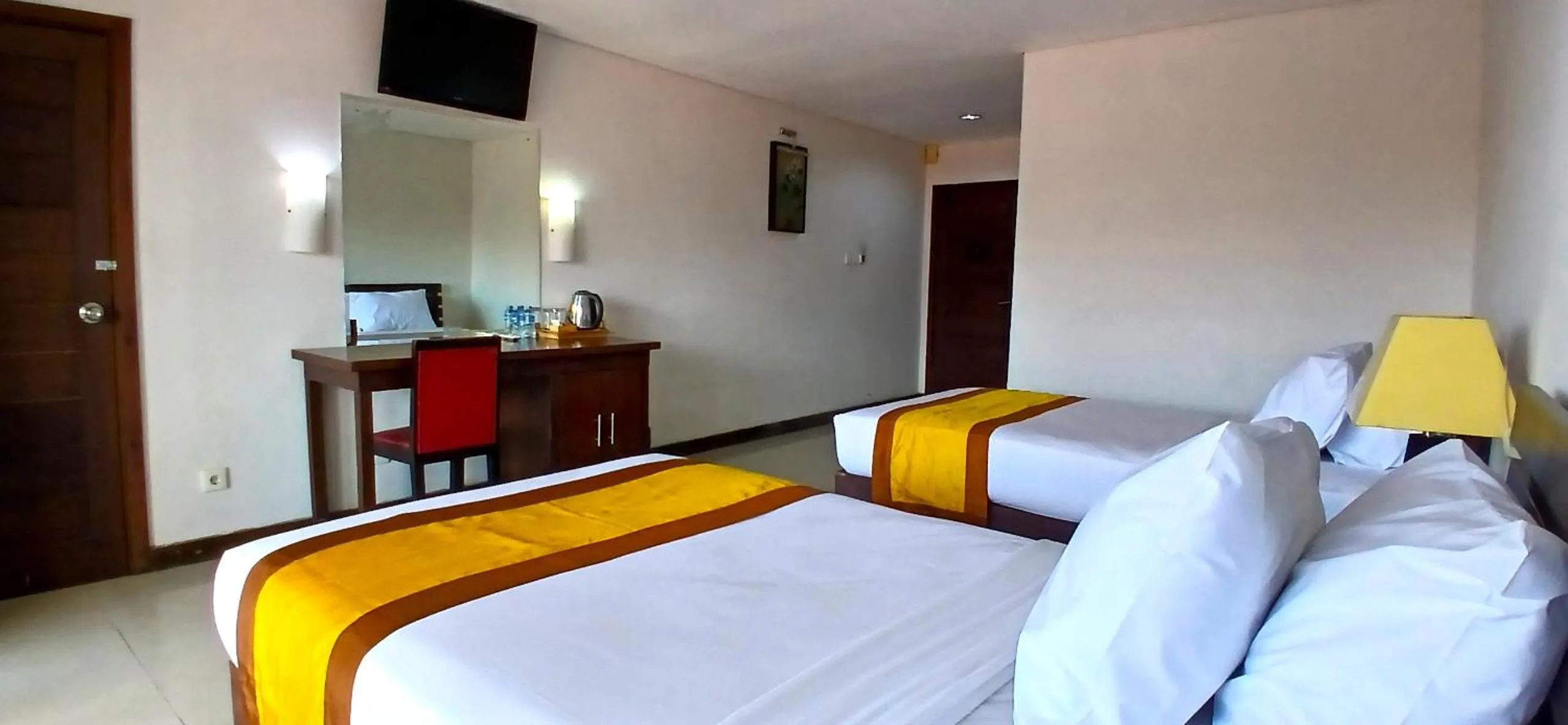Property building, Bed in Nirmala Hotel & Convention Centre