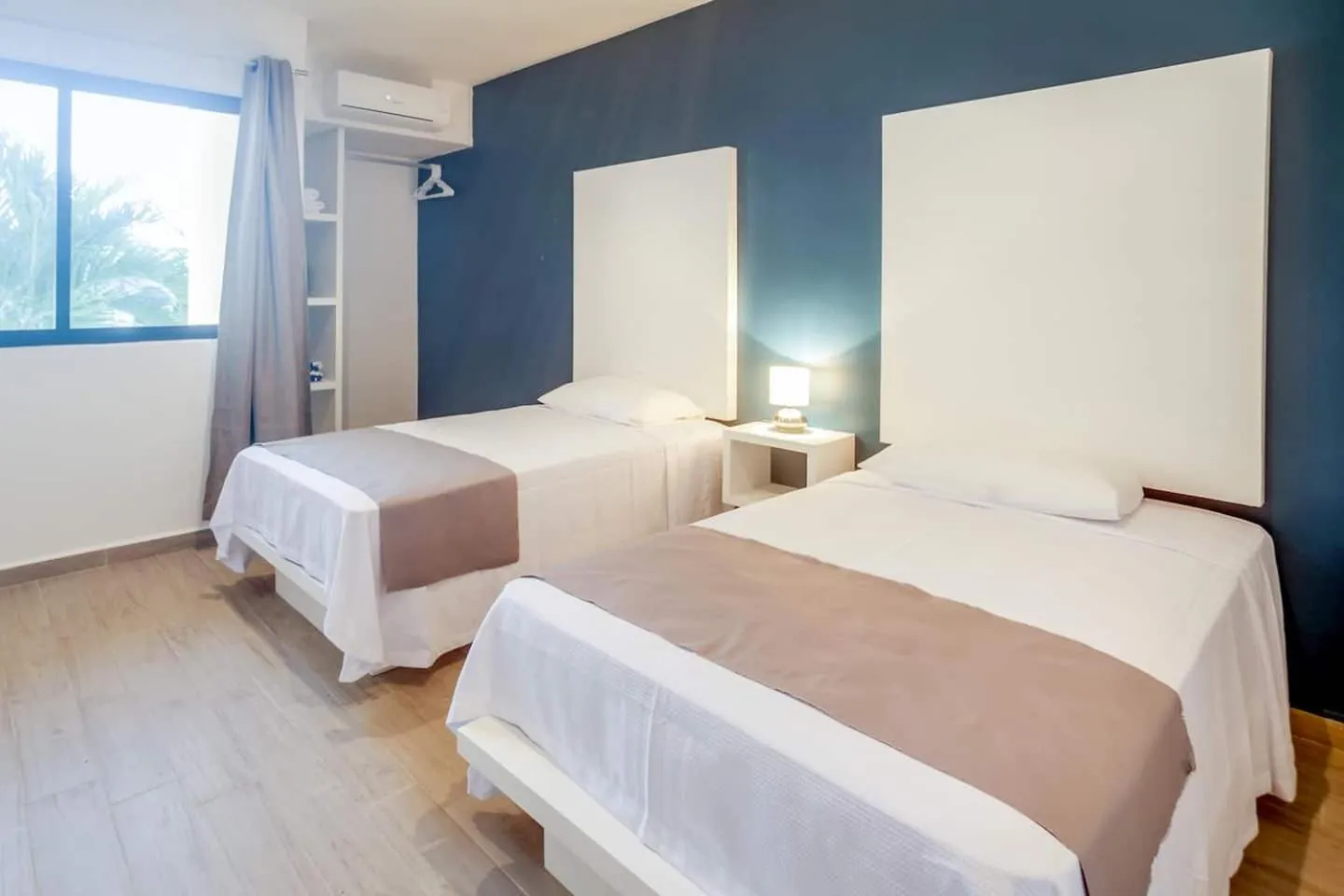 Bed in Valentina Suites by Las Flores Vacation Rentals