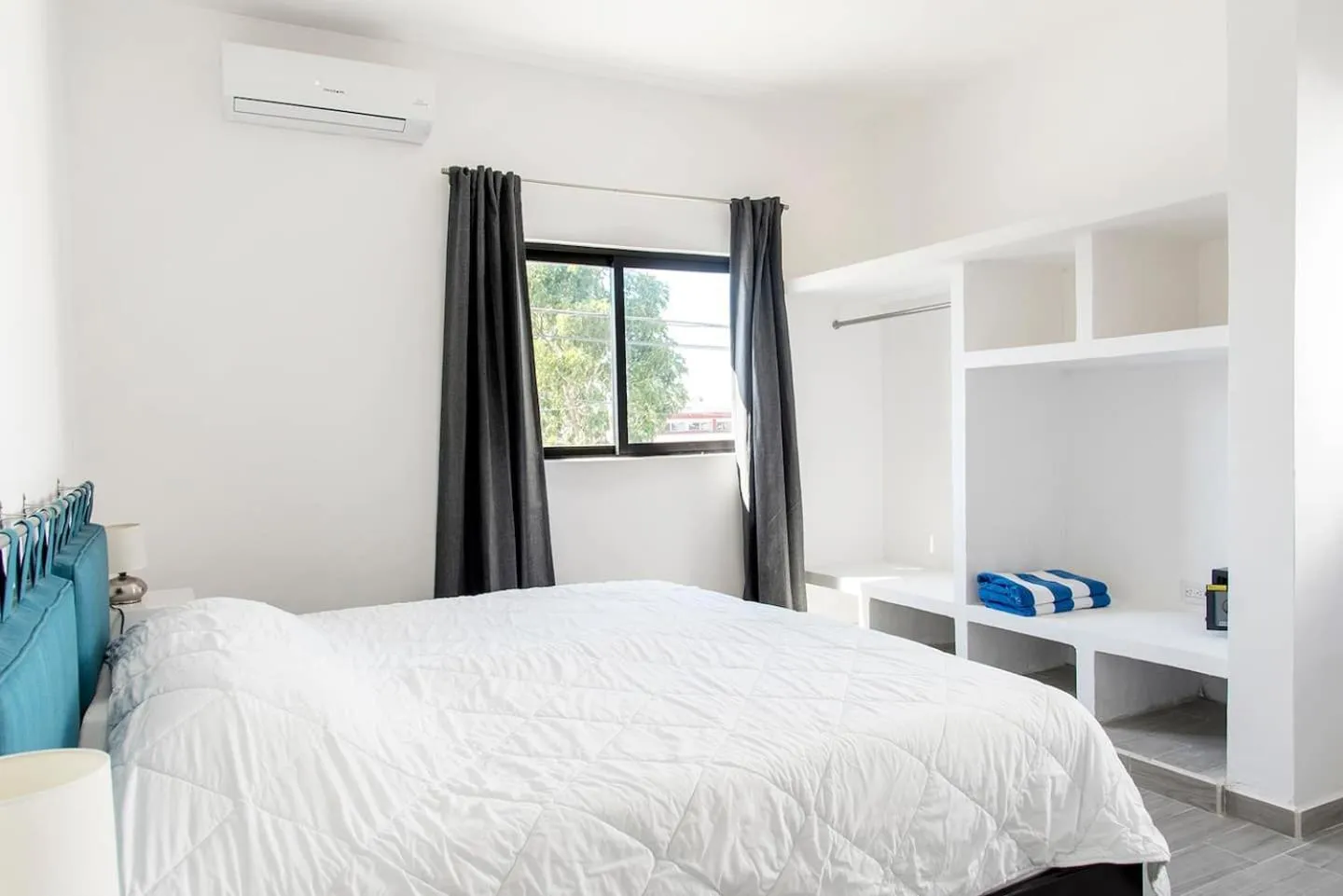 Bed in Valentina Suites by Las Flores Vacation Rentals