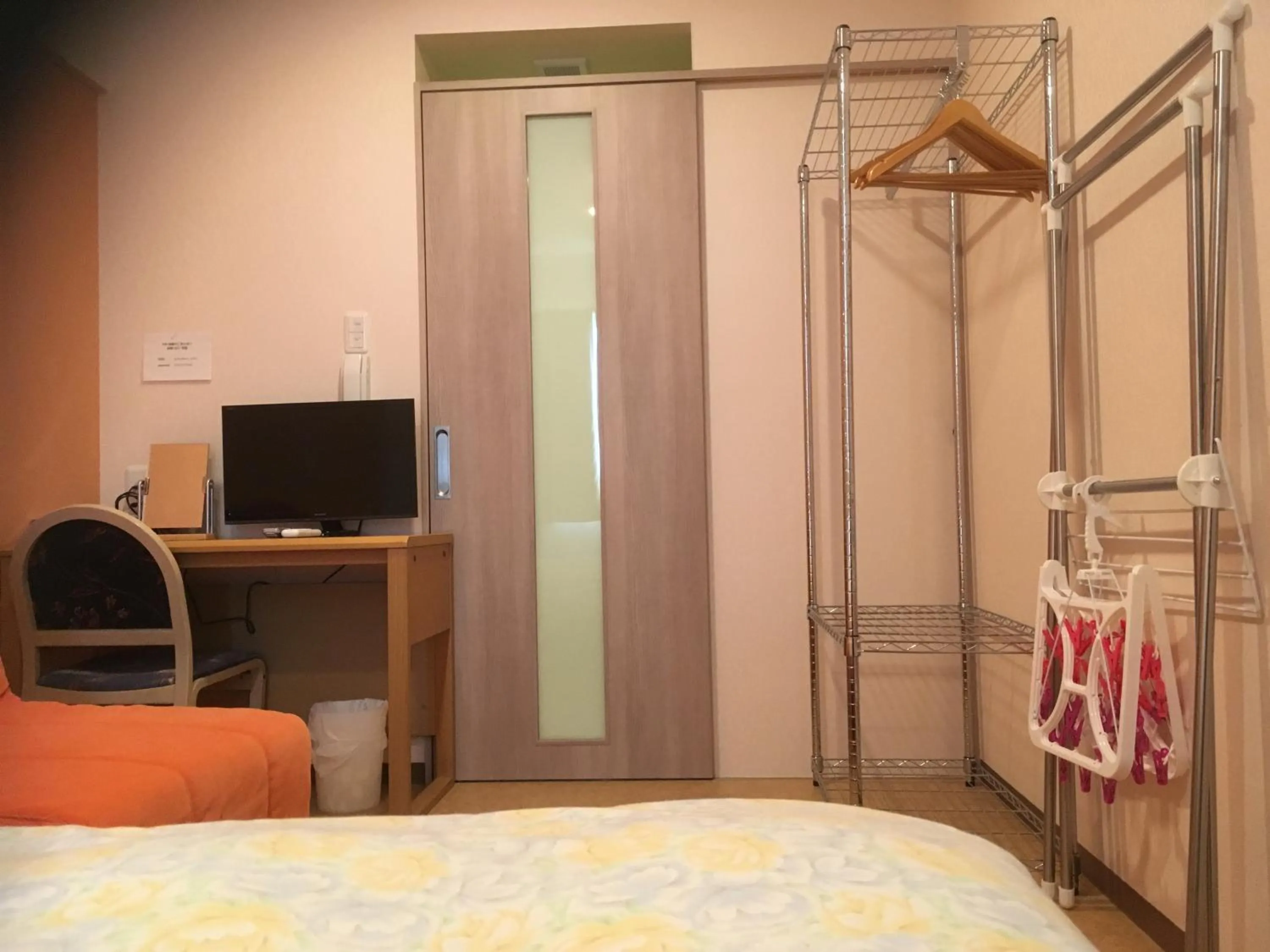 Bed in Hotel Asahi Grandeur Fuchu