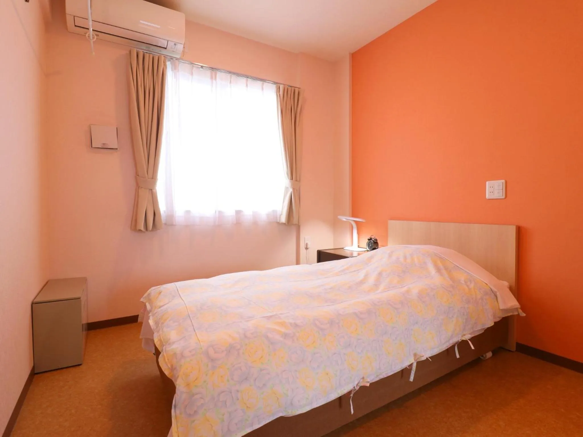 Bed in Hotel Asahi Grandeur Fuchu