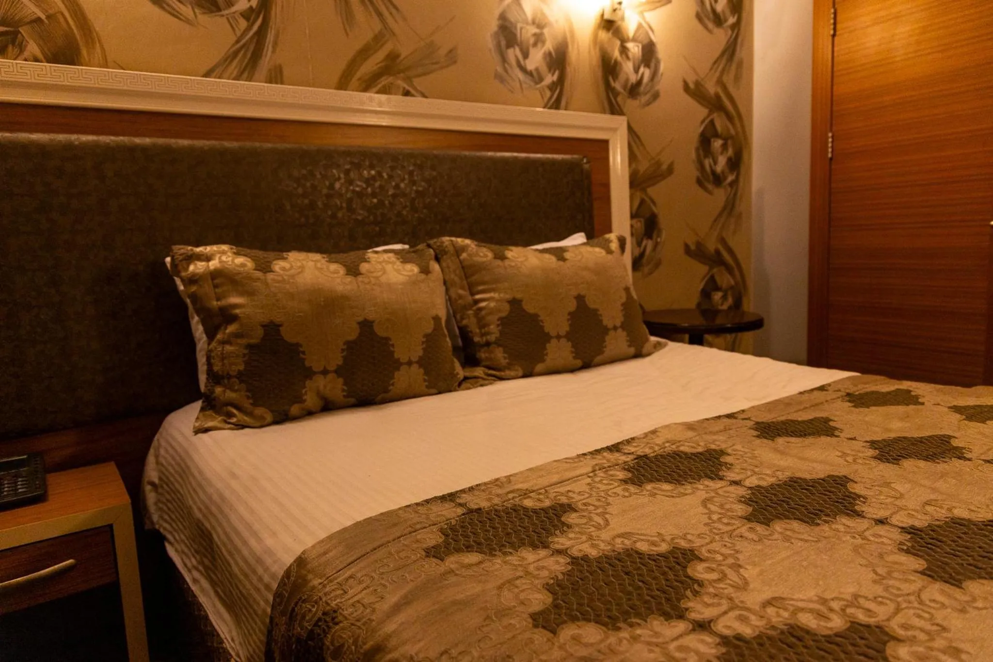 Bed in Grand Rosa Hotel