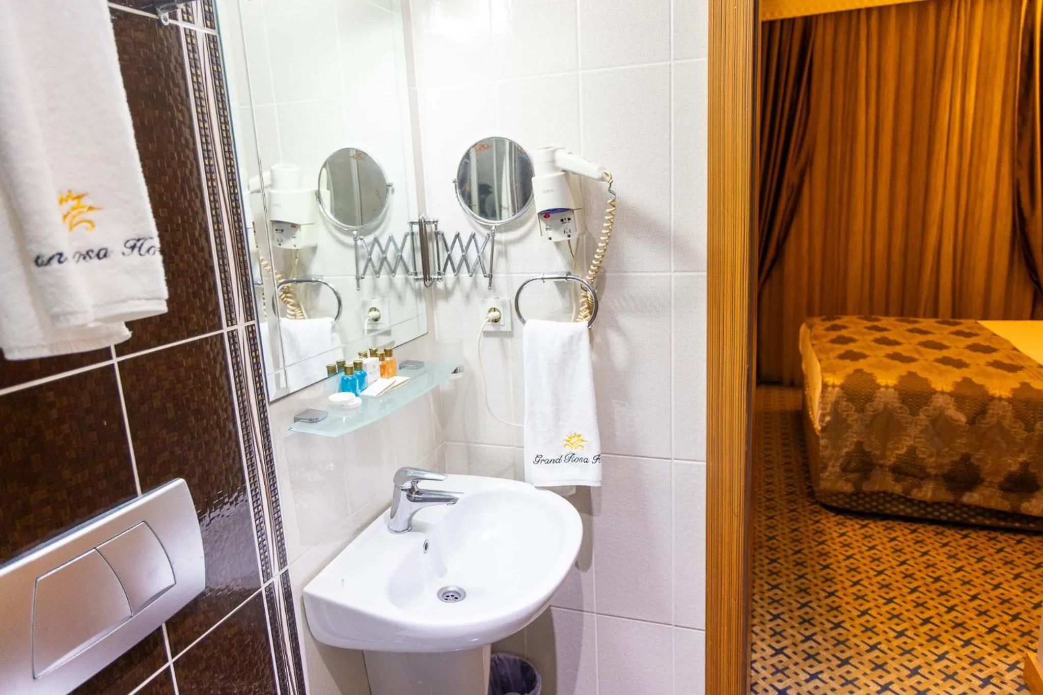 Shower, Bed in Grand Rosa Hotel