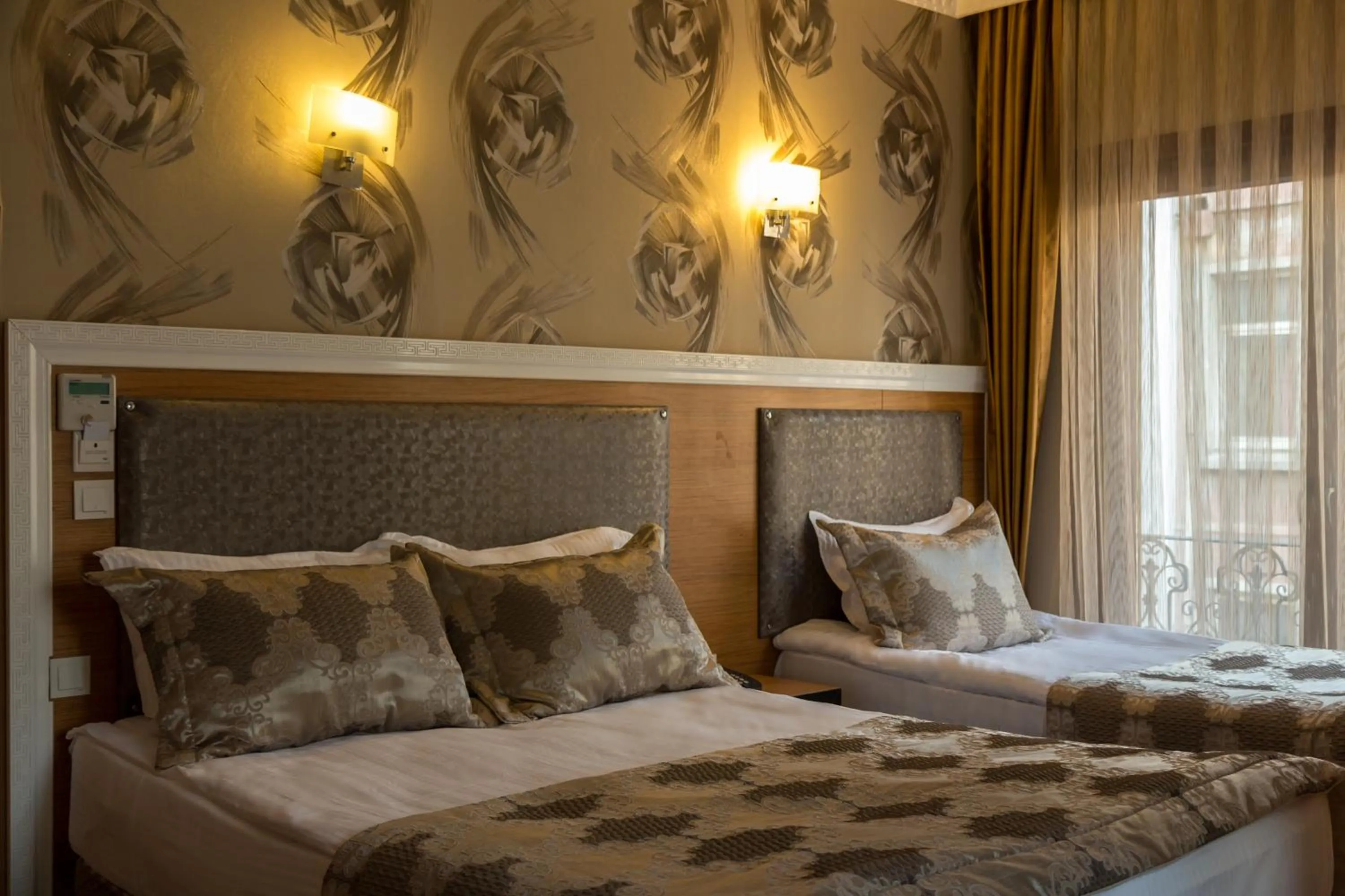 Bed in Grand Rosa Hotel